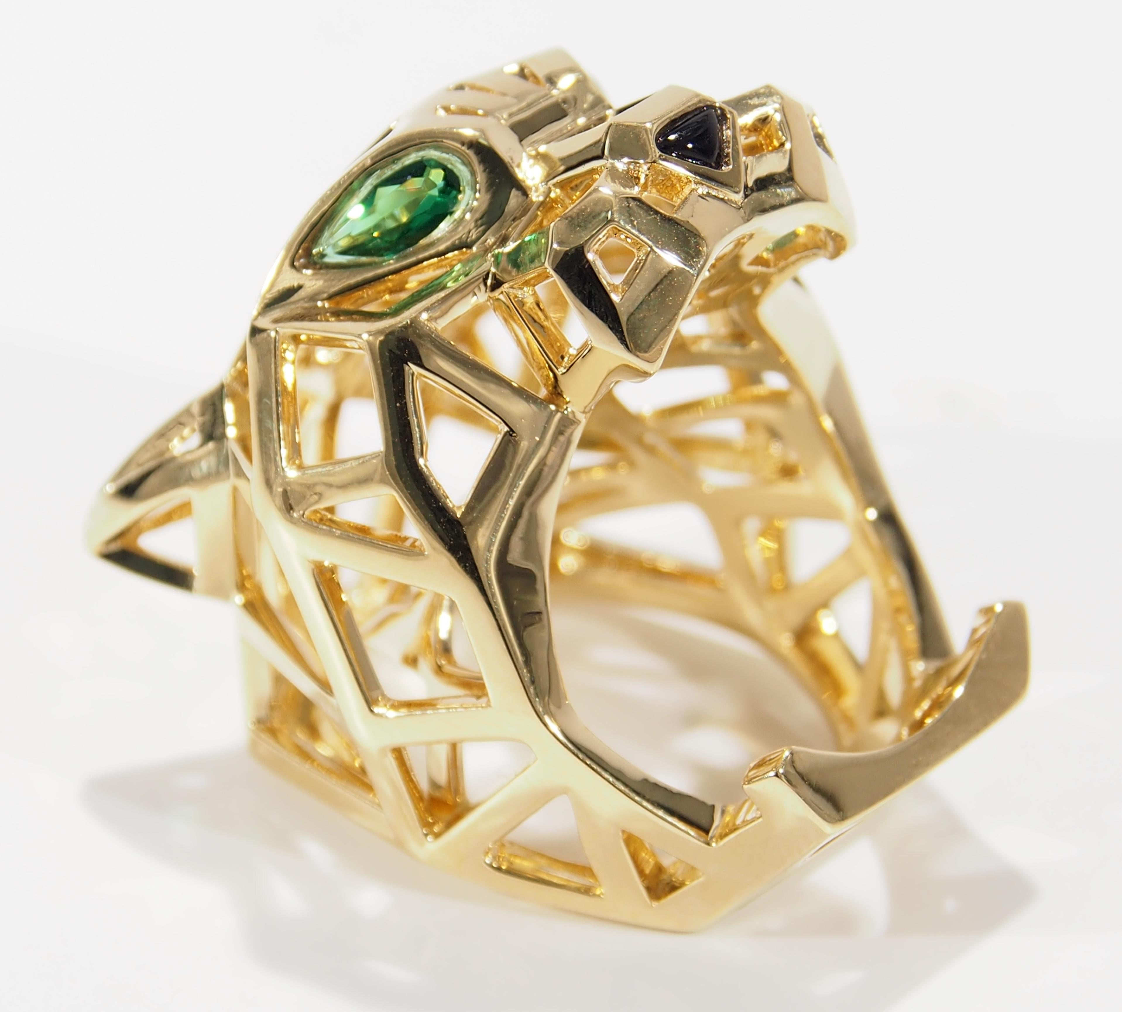 This is the iconic Cartier Panthere Ring first made desirable in jewelry design by Louis Cartier and has since become the symbolic animal of Cartier jewelry. This Cartier Panthere is stunningly designed with a geometric version of the animal's head.