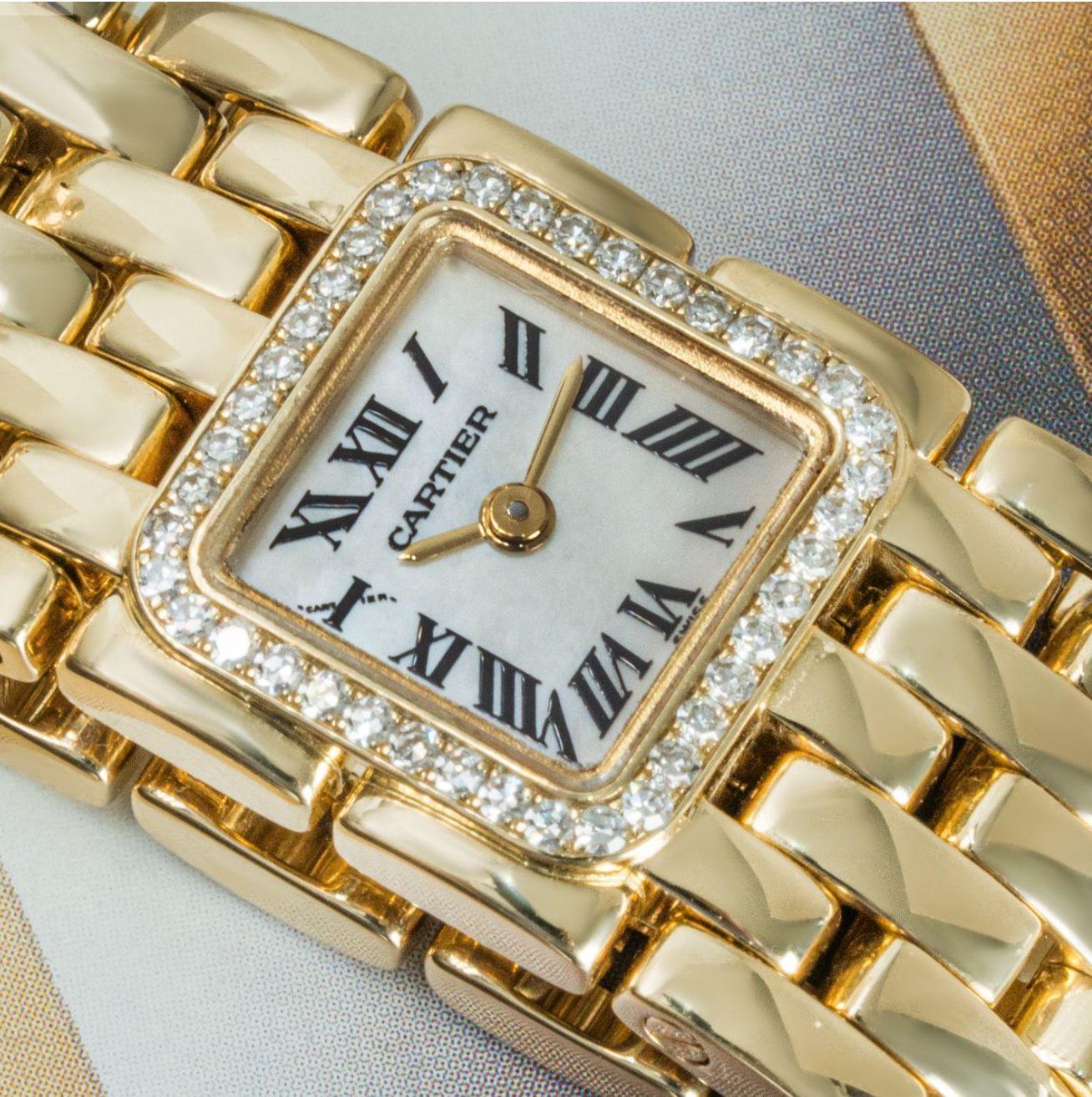 A yellow gold ladies Panthere Ruban by Cartier. Featuring a mother of pearl dial with roman numerals and a yellow gold bezel set with 40 single-cut diamonds weighing approximately 0.20ct. Fitted with a sapphire glass, a quartz movement and a yellow
