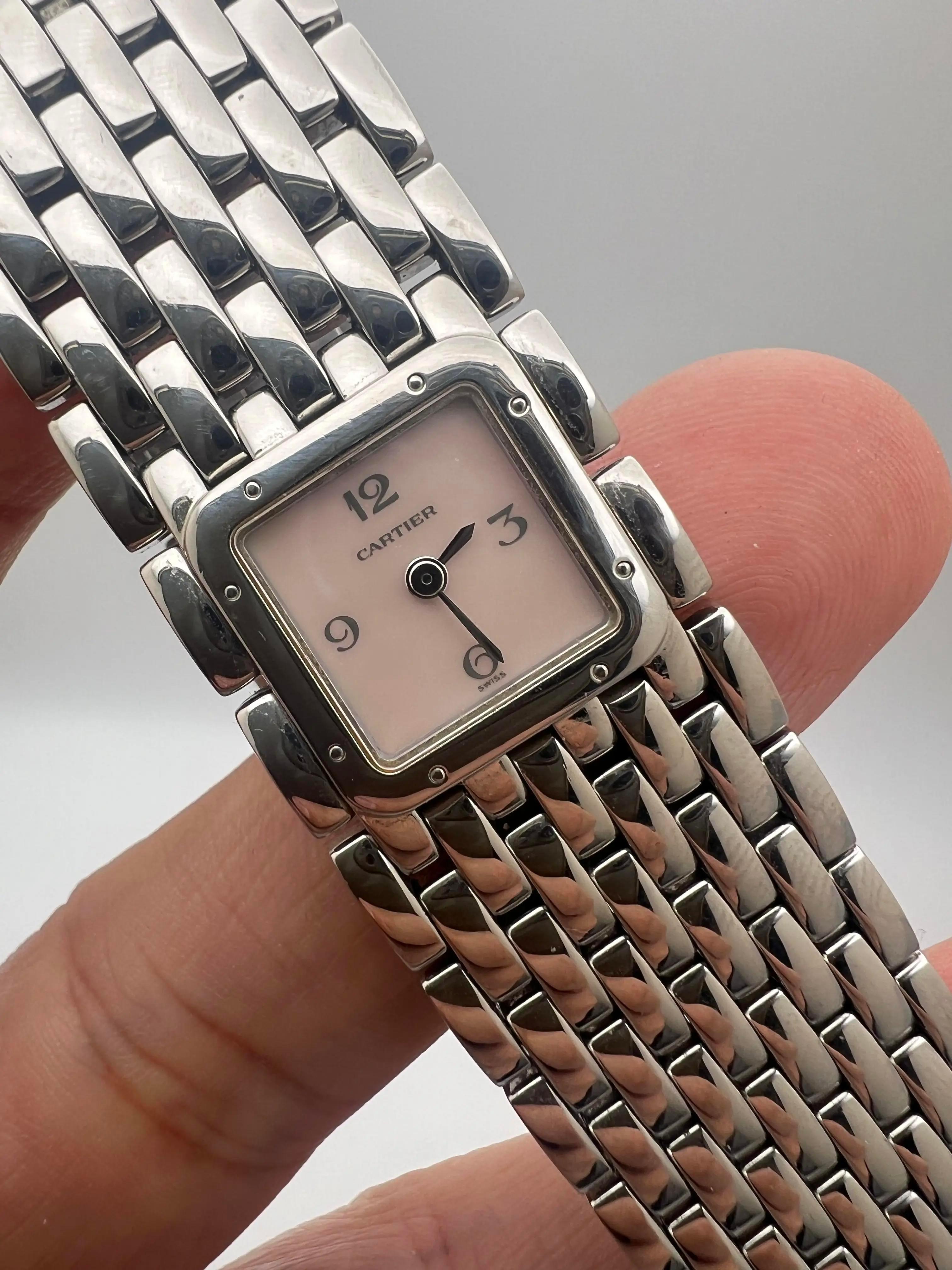 The Cartier Panthère Ruban (ref. W61003T9) is a refined timepiece that exemplifies Cartier's commitment to blending classic design with luxurious craftsmanship. Crafted from polished stainless steel, the 17mm square case is complemented by a smooth