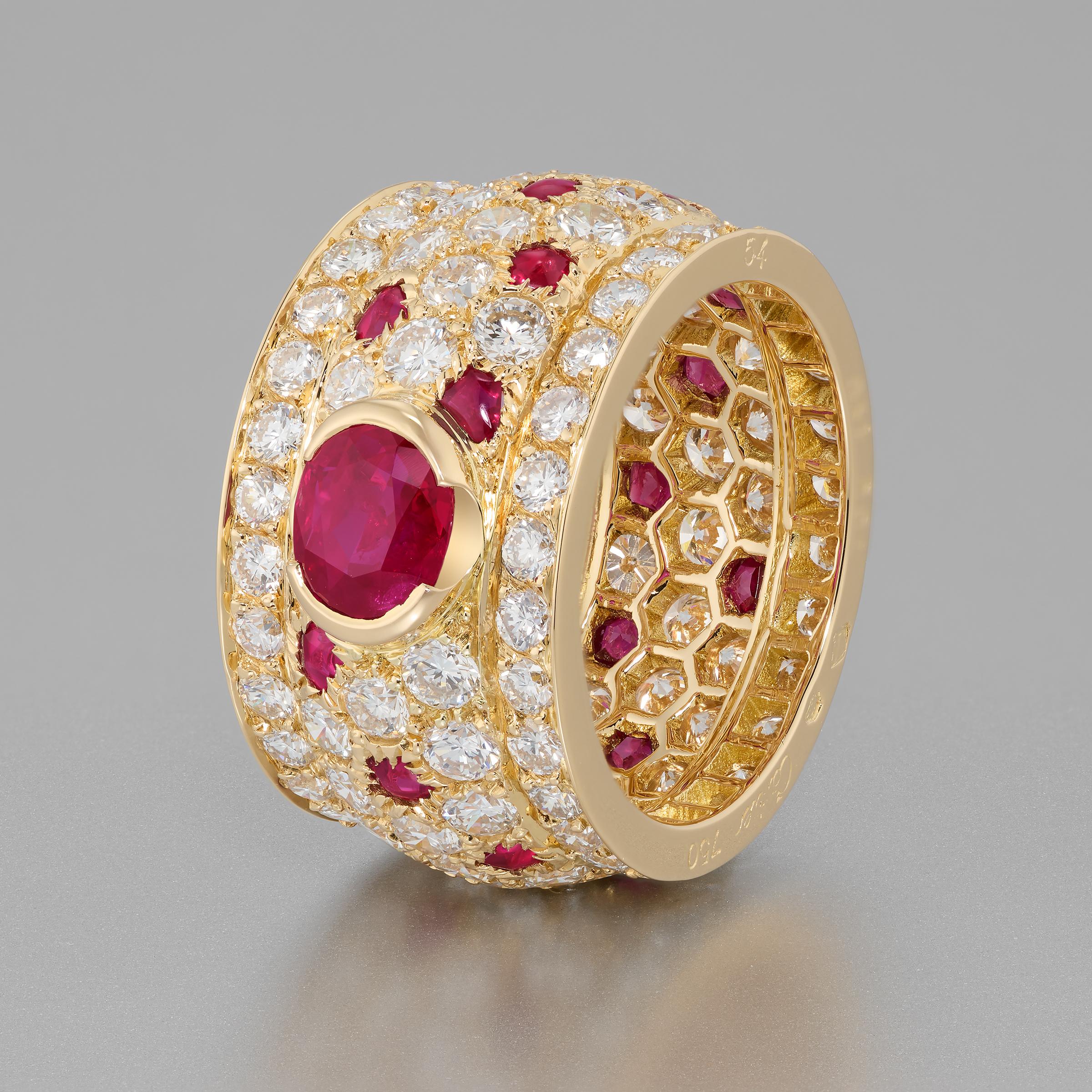 One-of-a-kind Cartier Panthere 'Shaki' ruby and diamond ring features 5 carats of glittering round brilliant diamonds in a fully-pavéd eternity setting interspersed with richly-colored red rubies. Crowning the ring’s center is a magnificent