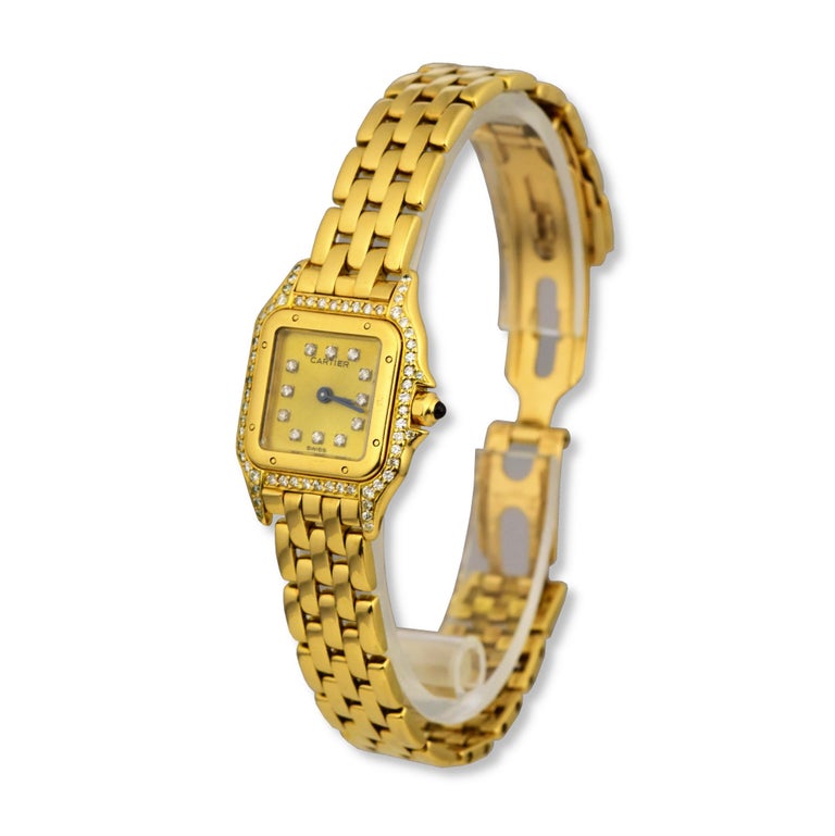 Panthere de Cartier watch, small model, quartz movement. Case in 18K yellow gold set with brilliant cut diamonds, dimensions: 22 mm x 30 mm, thickness: 6 mm, crown set with a diamond, silvered dial, blued-steel sword shaped hands, 18k yellow gold