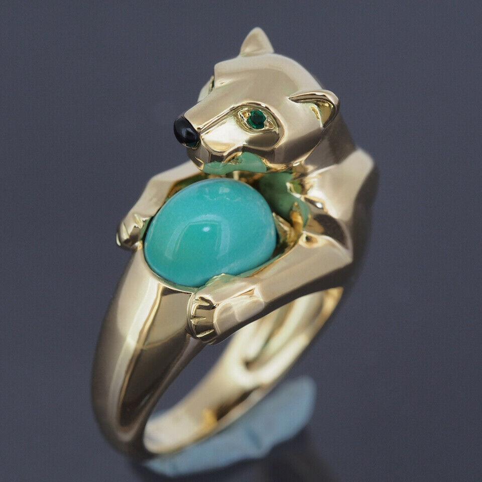 Item: Cartier Vedra Panther Ring
Stones: Turquoise, Emerald, Onyx
Metal: 18K Yellow Gold
Ring Size: 54 US 6.5 UK M 1/2
Internal Diameter: 17.0 mm
Measurements: 3 - 13 mm Width
Weight: 15.4 Grams
Condition: Used (repolished), Very Good