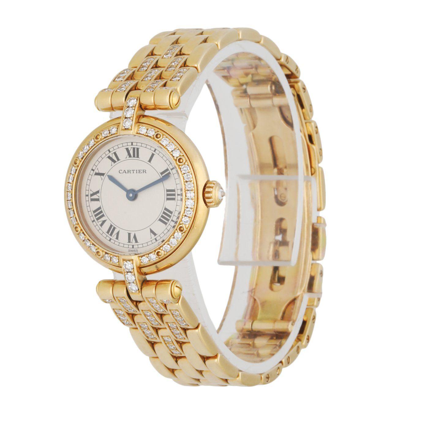 Cartier Panthere Vendome 8057916 Yellow Gold Ladies Watch. 24 mm solid 18K yellow gold case and with diamond bezel. White dial with blue steel hands and black Roman numeral hour markers. 18k yellow gold bracelet with diamond and 18k yellow gold