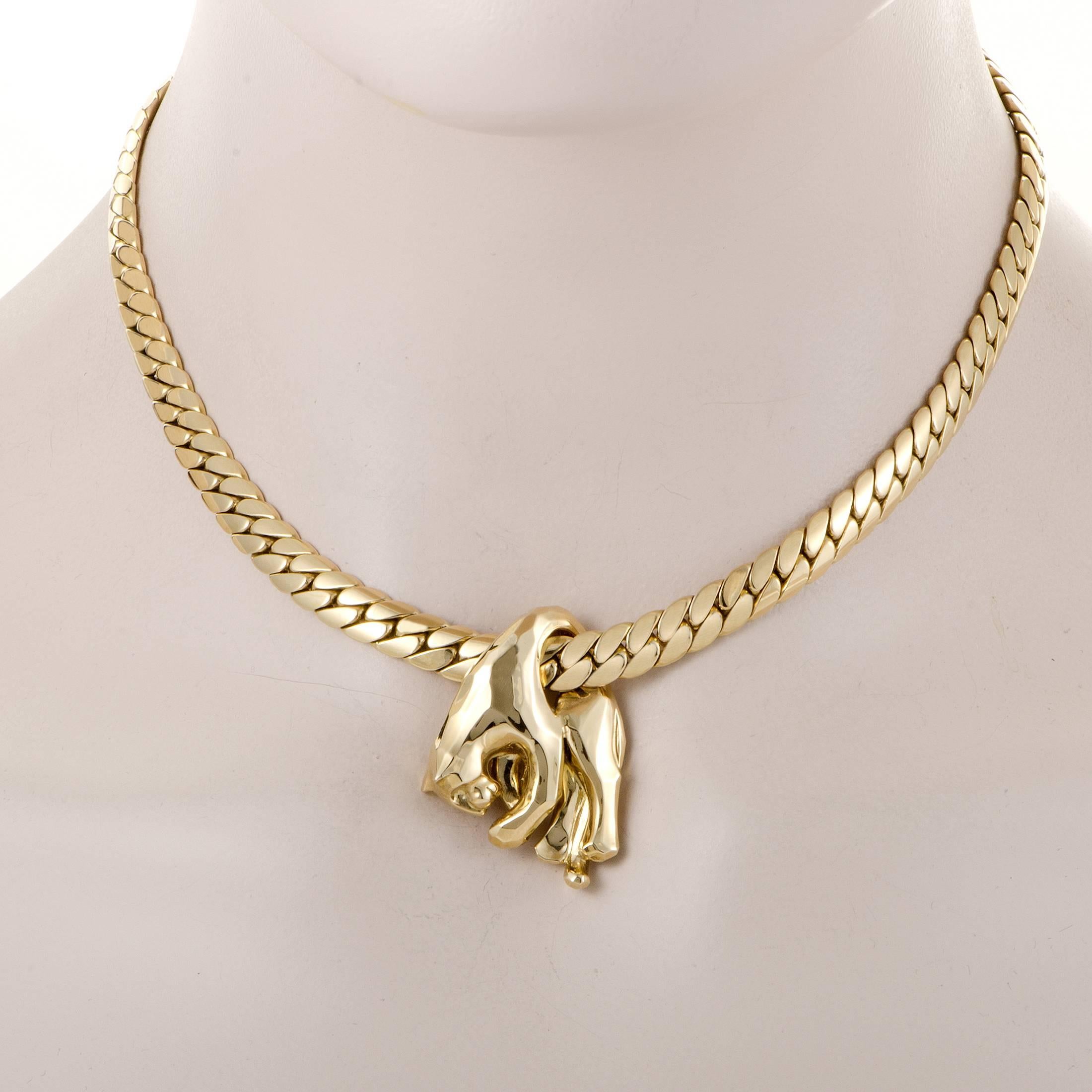 The compelling vintage style and refined taste of this very rare 18K yellow gold necklace from Cartier produce an aura of classic luxury while the intriguing pendant boasts the brand's iconic shape of a panther in a slightly offbeat interpretation.