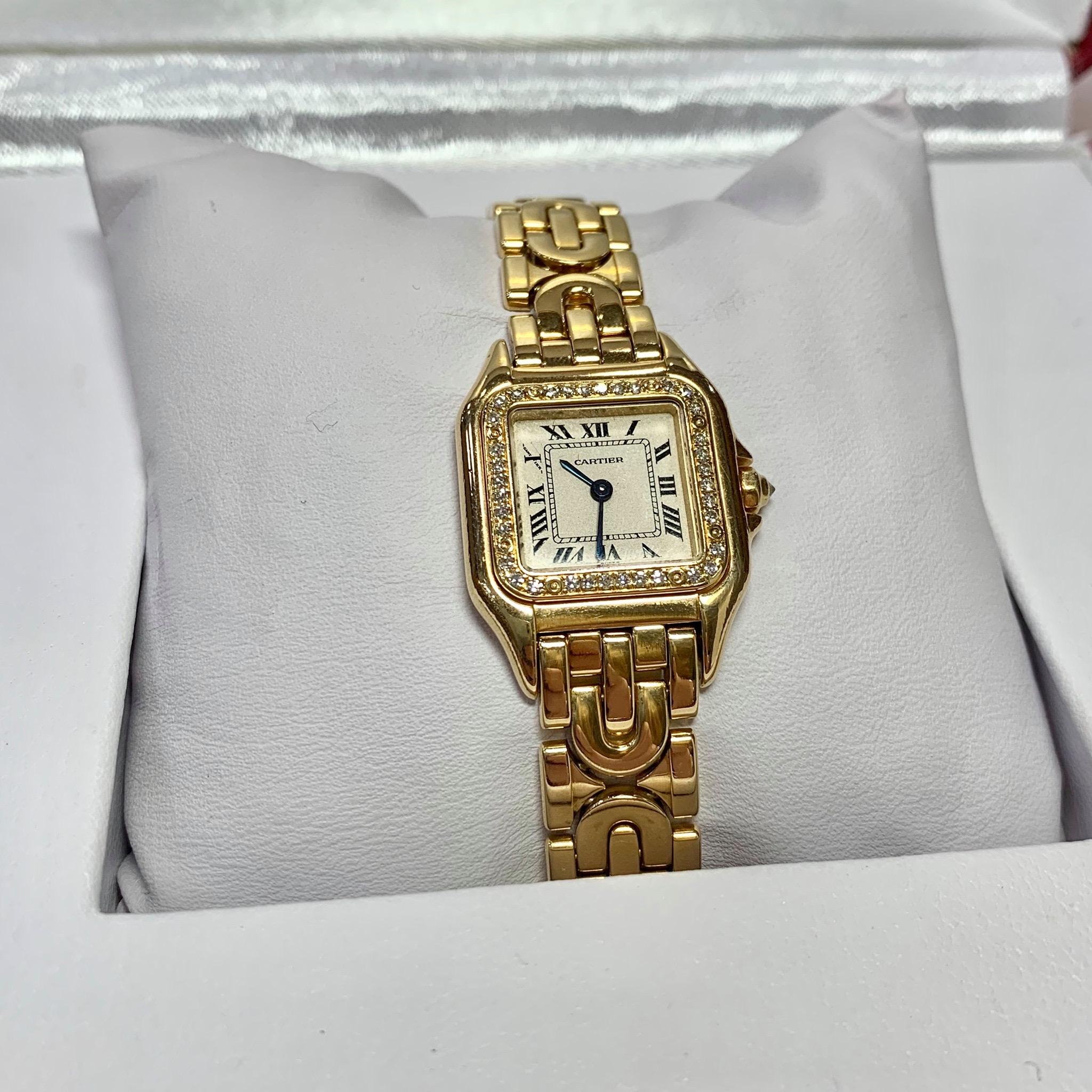 Cartier Panthere Yellow Gold Diamond Ladies Watch. On a rare 18ct Yellow gold strap. With a cream dial with black Roman numeral hour markers. Set with 36 round brilliant cut Diamonds on the bezel. Quartz movement.
In original box.

Diameter :