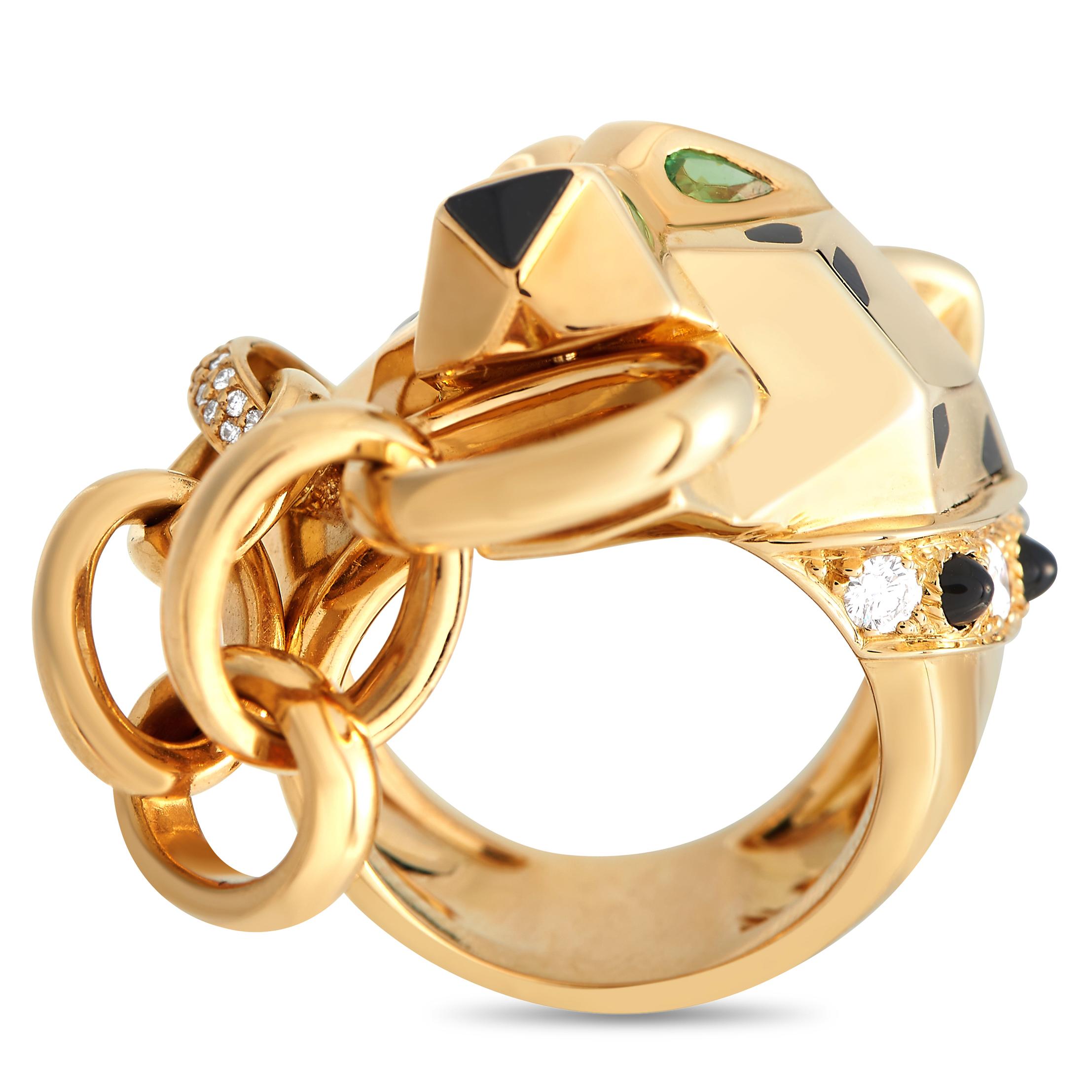 A majestic statement ring for the fierce fashionista. This meticulously crafted yellow gold ring from Cartier's luxurious Panthre de Cartier collection features a panther's head incorporated into the band. The geometric panther's head has green