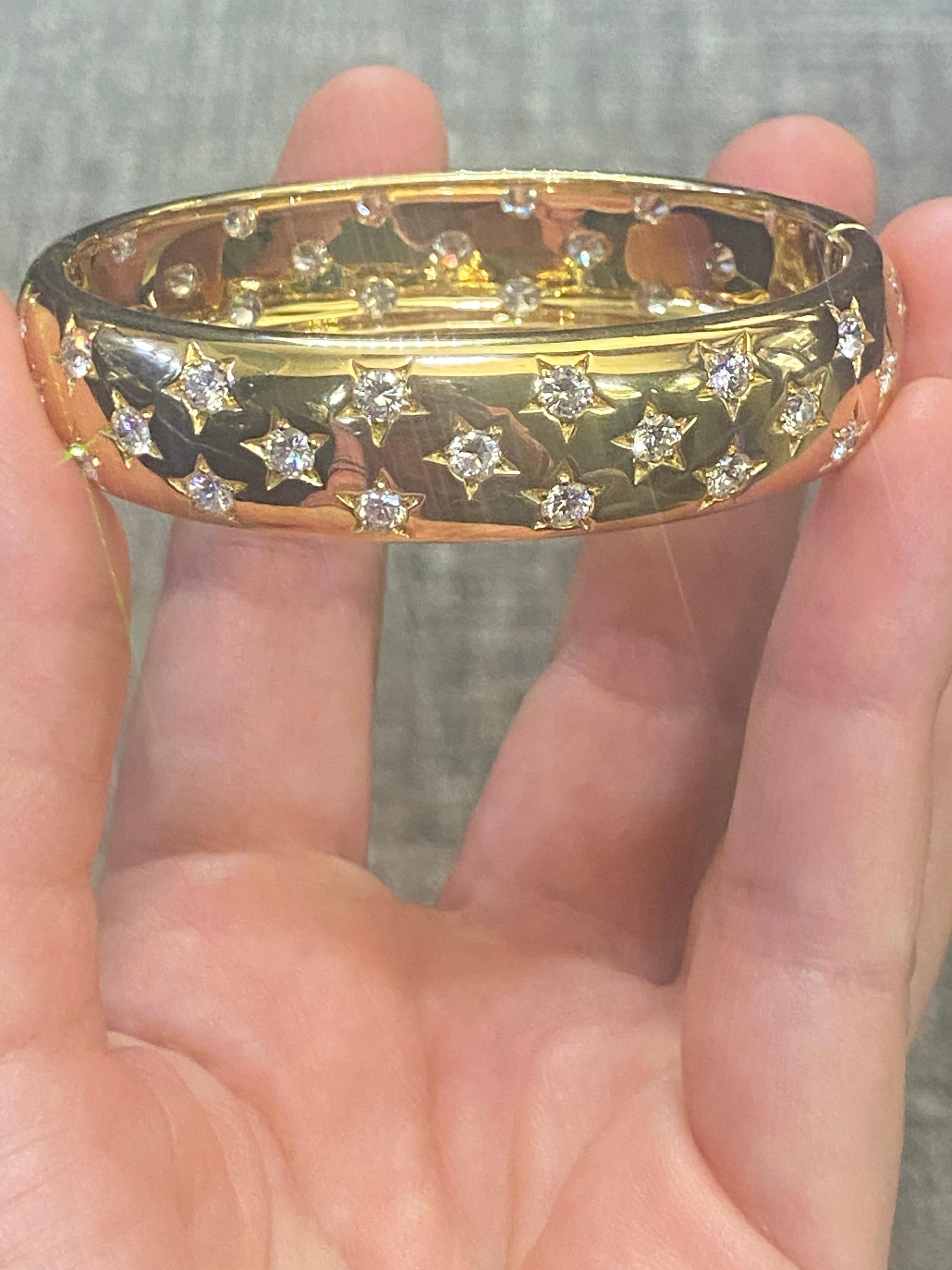 Contemporary Cartier Paris 18k gold and diamond bangle