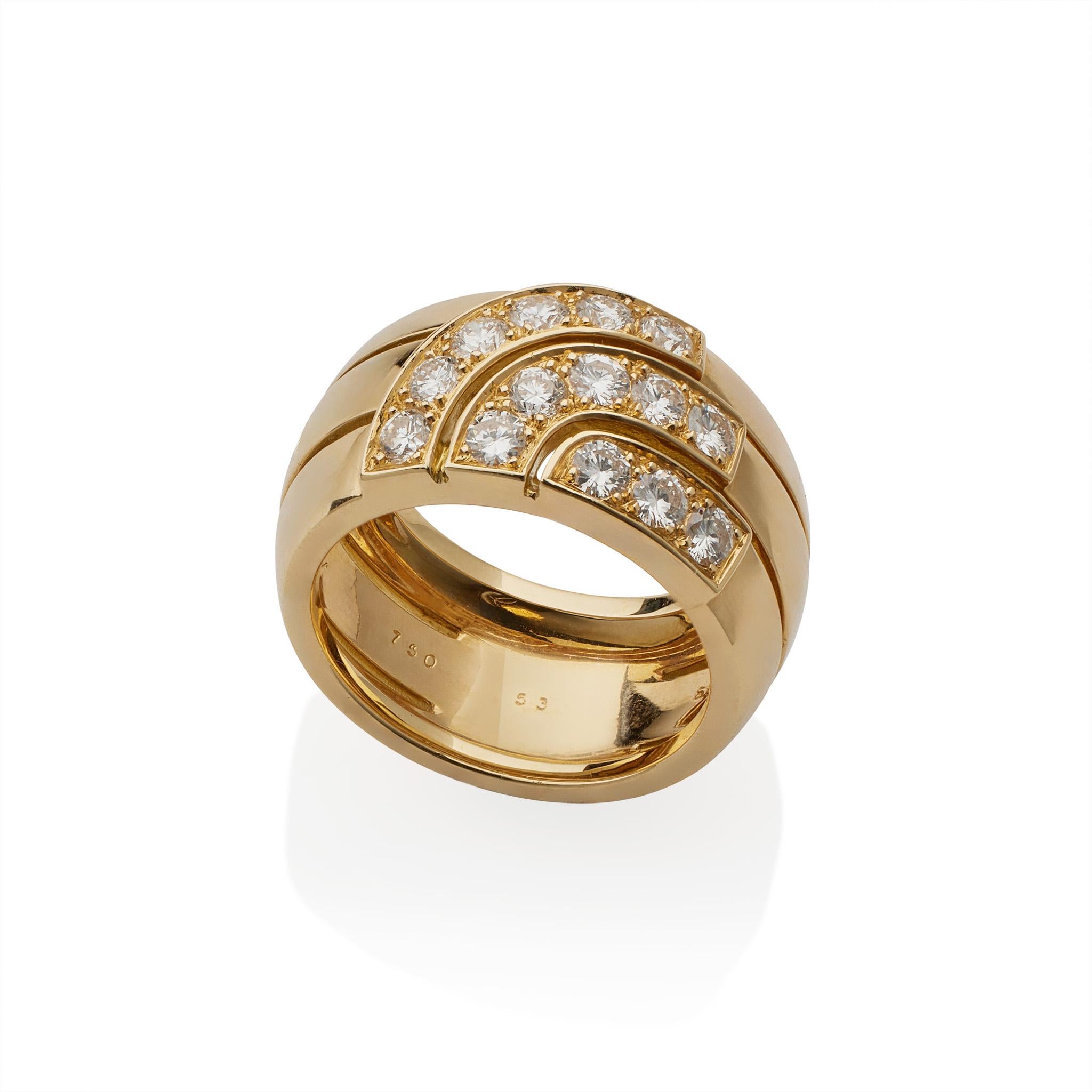 Created in the 1980s, this Cartier Paris ring is composed of 18K gold and diamonds. The slightly bombé form is designed a broad, incised triple band centering arched lines of round brilliant-cut diamonds. From the structured and streamlined 1980s,