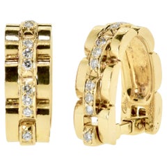Cartier Paris Boutons de manchette vintage Maillon Panthère en or jaune 18 carats et diamants