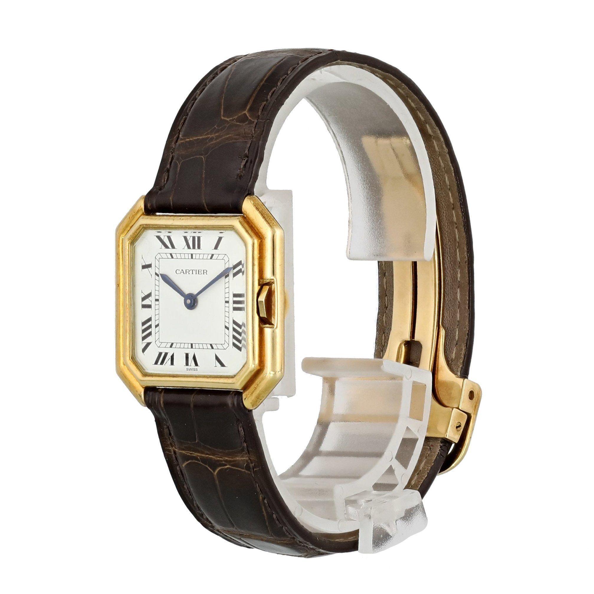 Cartier Paris 18k Yellow Gold Vintage Ladies Watch.
31mm 18k Yellow Gold case. 
Yellow Gold Stationary bezel. 
Off-White dial with  Blue steel hands and Roman numeral hour markers. 
Minute markers on the inner dial. 
Leather Alligator Strap with