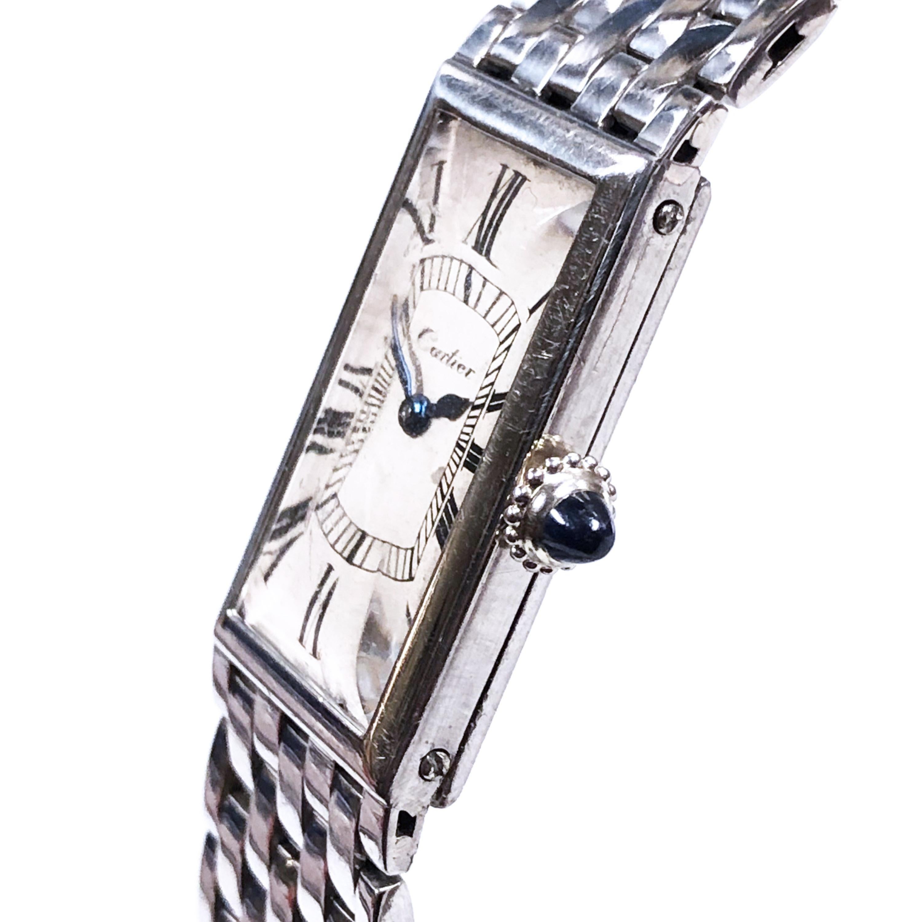 Circa 1940 Cartier Paris Platinum Bracelet Wrist watch. 24 X 15 MM 2 Piece 4 MM thick Platinum case. Mechanical, Manual wind European Watch and Clock Movement, Sapphire Crown. Original White Dial with Black Roman numerals and Blue steel hands. The