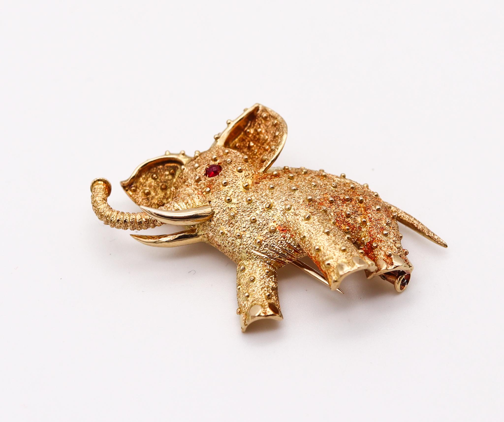 An elephant brooch designed by Cartier.

Beautiful rare jewelry piece, created in Paris France by the house of Cartier during the postwar period, circa 1950. This pin brooch has been crafted in the shape of an African elephant in solid yellow gold