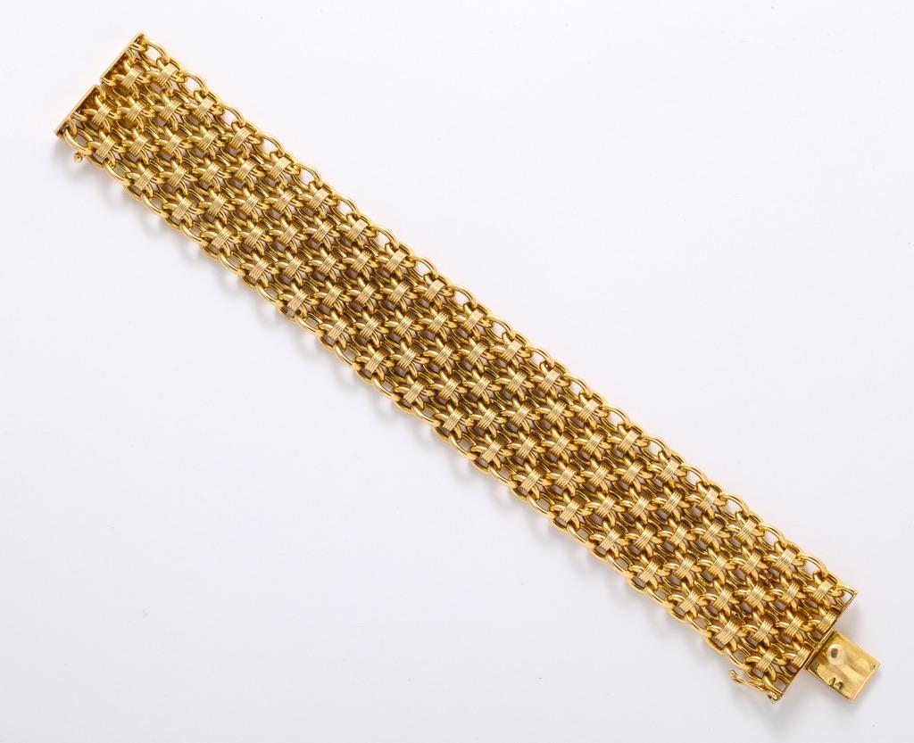 Cartier, Paris 1950’s Gold Bracelet
Signed and numbered by Cartier, Paris this exceptional bracelet also features the maker’s mark of the venerable A. Gross et Cie. (1883-1986).  Originally founded in 1883 as Gross, Langoulant et Cie., this company
