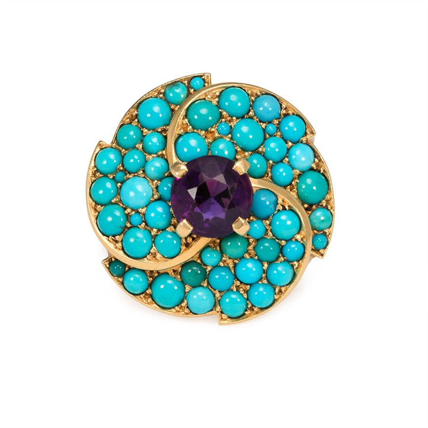 A Retro gold and pavé turquoise ring of florette design set with an amethyst center, in 18k. Cartier, Paris #L9575

Sits approximately 7/16