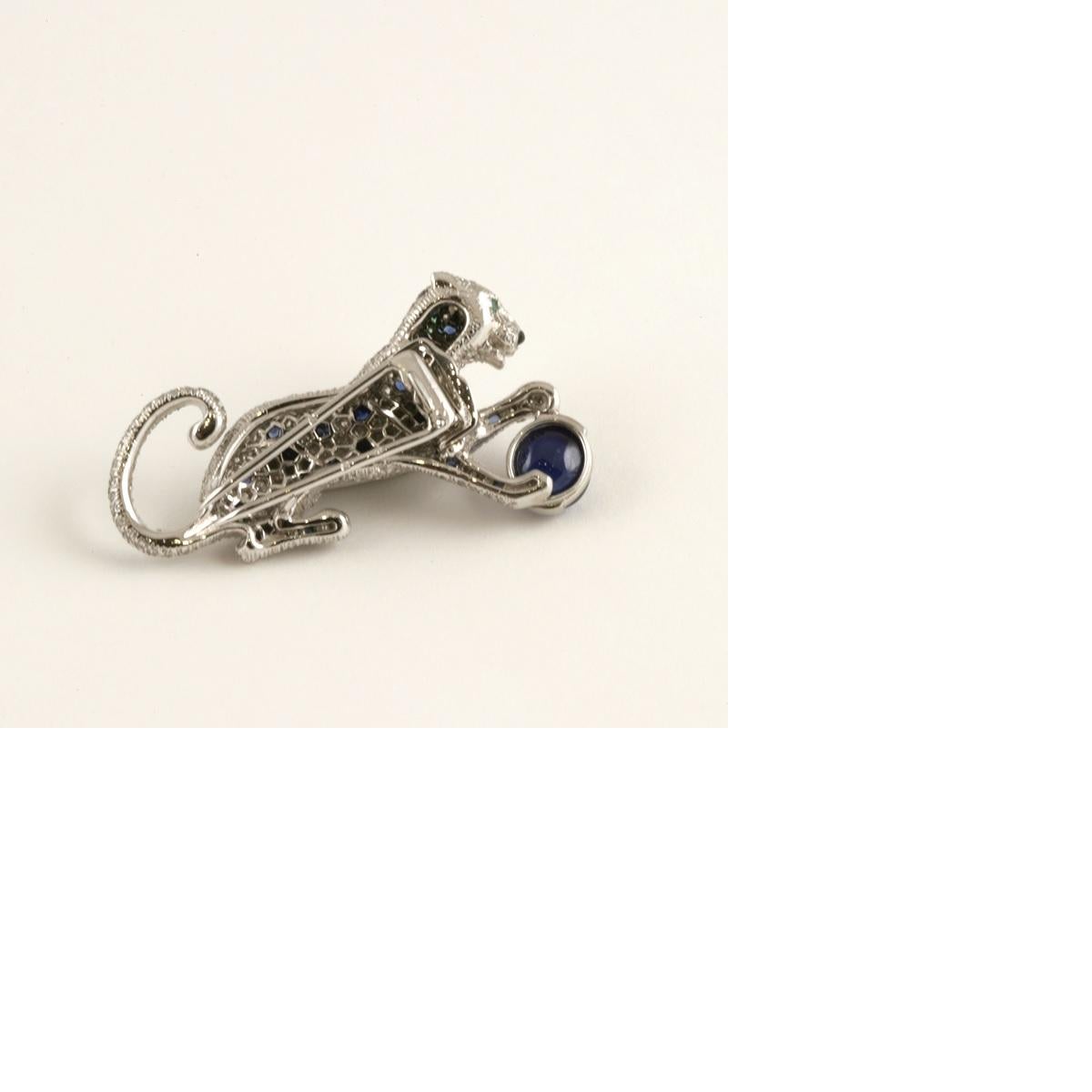 Cartier Paris 1980s Diamond, Sapphire and Platinum 'Panthère' Brooch In Excellent Condition In New York, NY