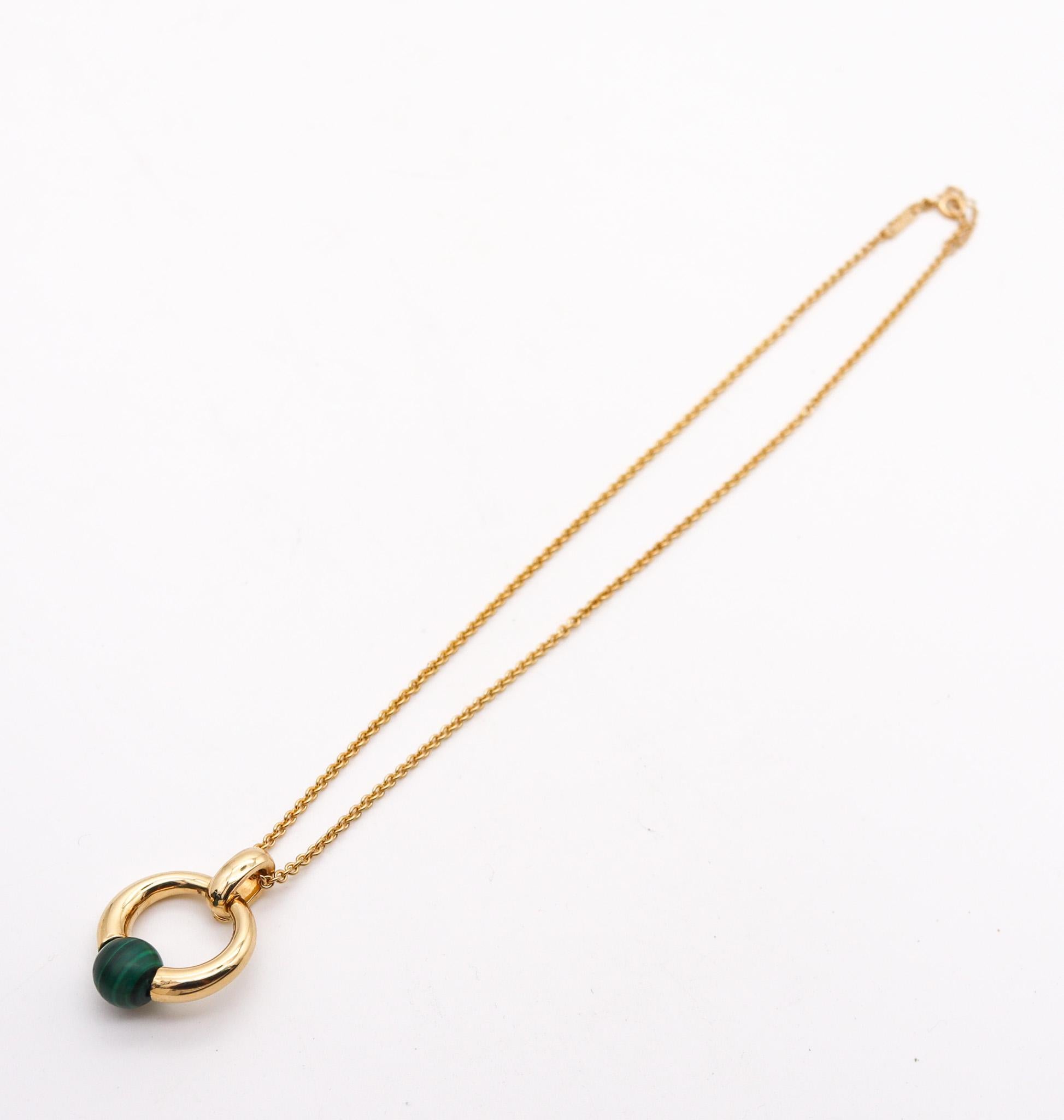 Malachite necklace pendant designed by Cartier.

This is a very rare and very hard to find necklace-pendant, created in Paris France by the jewelry house of Cartier. It was carefully crafted back in the late 20th century in solid yellow gold of 18