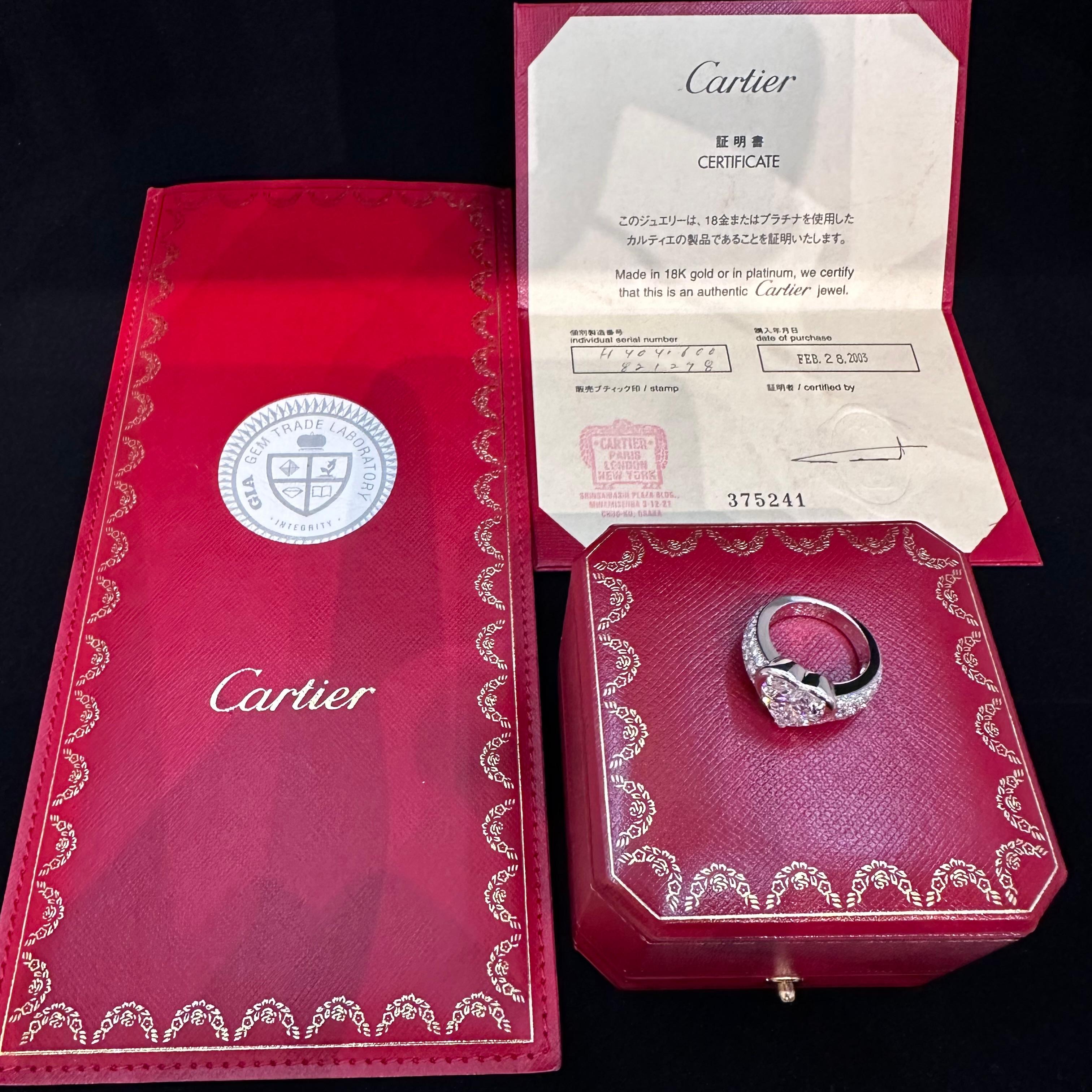 Cartier Paris Important Diamond Ring
3.32 ct D Internally F turn offlawless  
18k White Gold wide Band Style Ring.
The Center Heart Shape is 3.32 cts 
Certified report  by the gemology Institute of America (GIA) as a D Internally Flawless Diamond.