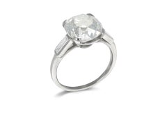 Cartier Paris 4.37 carat diamond flanked solitaire, French, 1937.