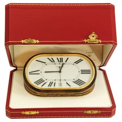 Reloj acordeón Cartier París con fecha y esfera blanca de números romanos Circa 1980