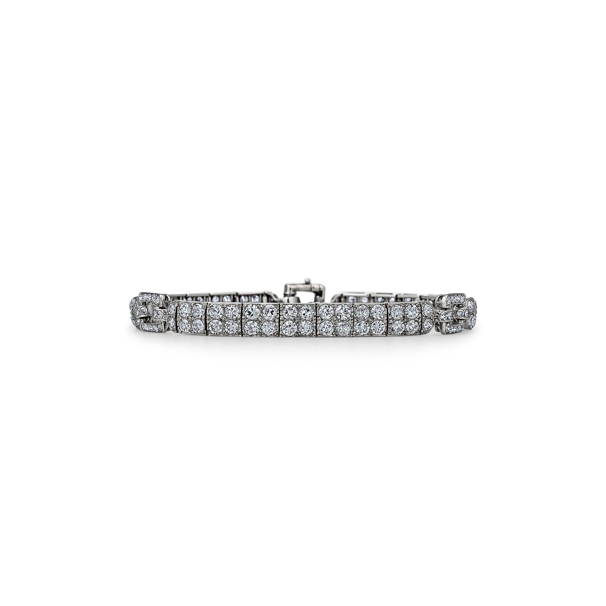 Wearable everyday, this Art Deco diamond platinum bracelet has a powerful timeless spirit and a modern casual feel.  With a total of approximately 6.75 carats of shimmering old European cut round diamonds, this collectible bracelet was designed with