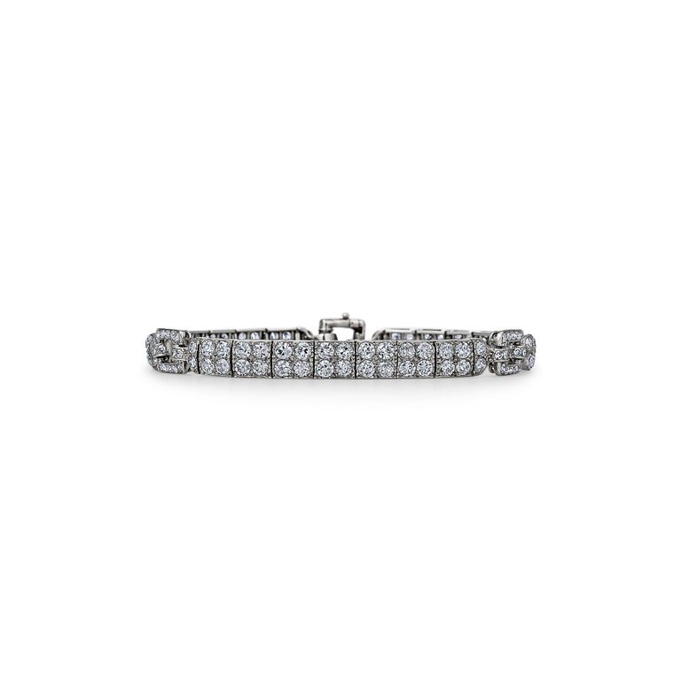 Wearable everyday, this Art Deco diamond platinum bracelet has a powerful timeless spirit and a modern casual feel.  With a total of approximately 6.75 carats of shimmering single cut round diamonds, this collectible bracelet was designed with a