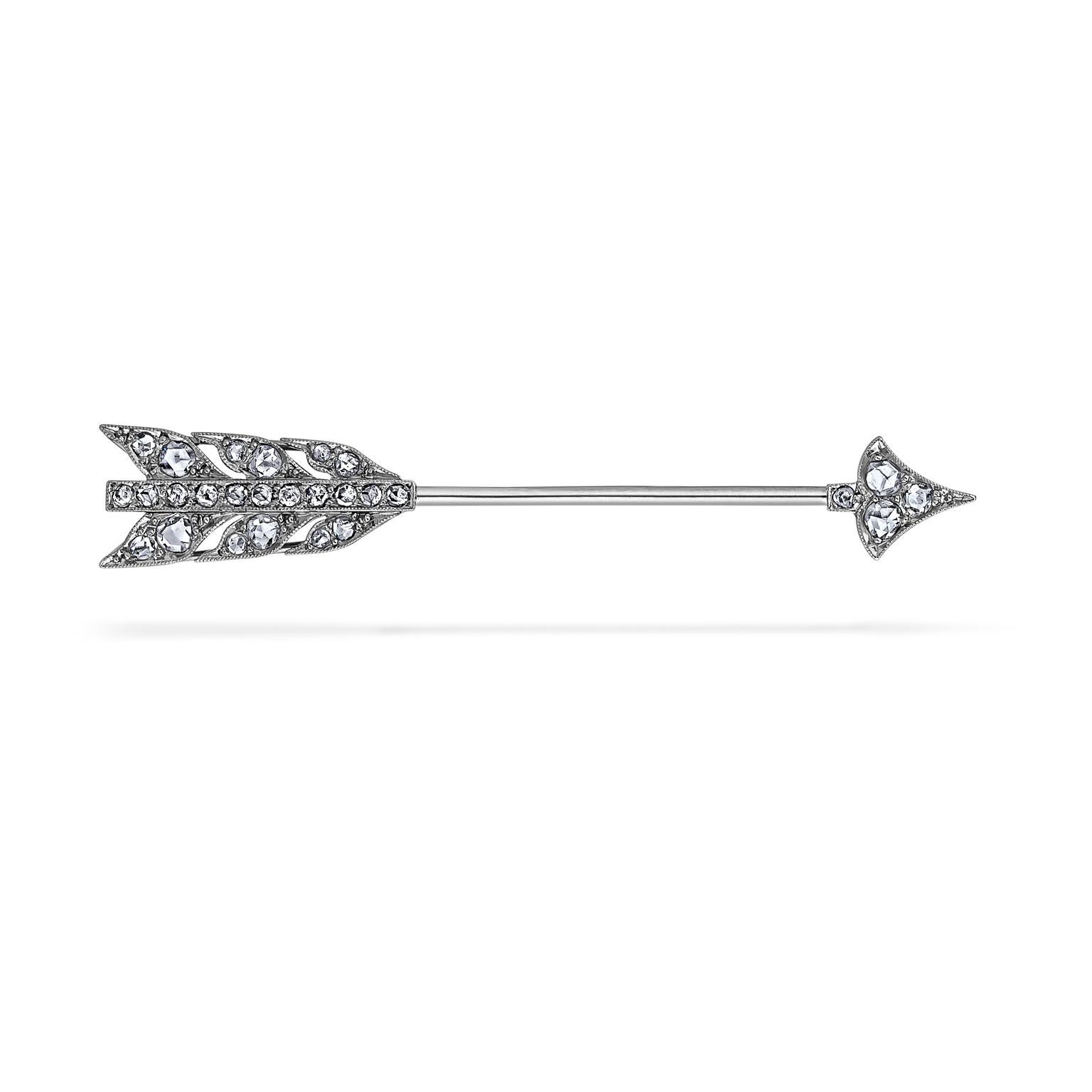 Your love will always be 'straighter than an arrow' when wearing this Cartier Paris Art Deco Diamond Platinum Gold brooch.  With a total of approximately .35 carats of round cut dazzling diamonds mounted in platinum, this elegant arrow pin is sure