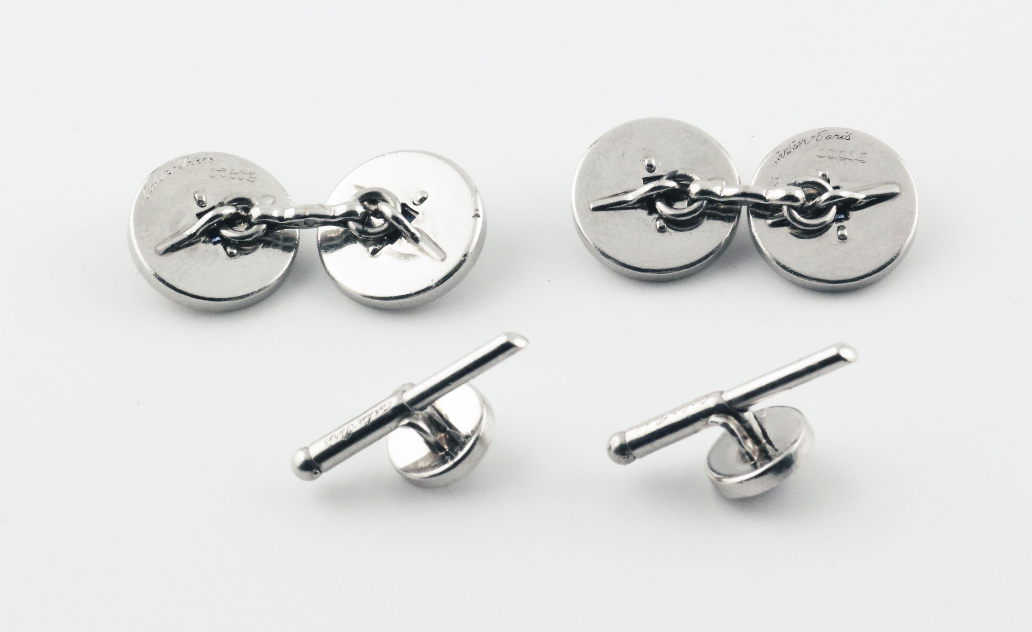 The Cartier Paris Art Deco Sapphire Platinum Cufflinks and Stud Dress Set is a remarkable example of the opulence and elegance characteristic of the Art Deco era. This exquisite set, crafted by the iconic house of Cartier, exemplifies the refined