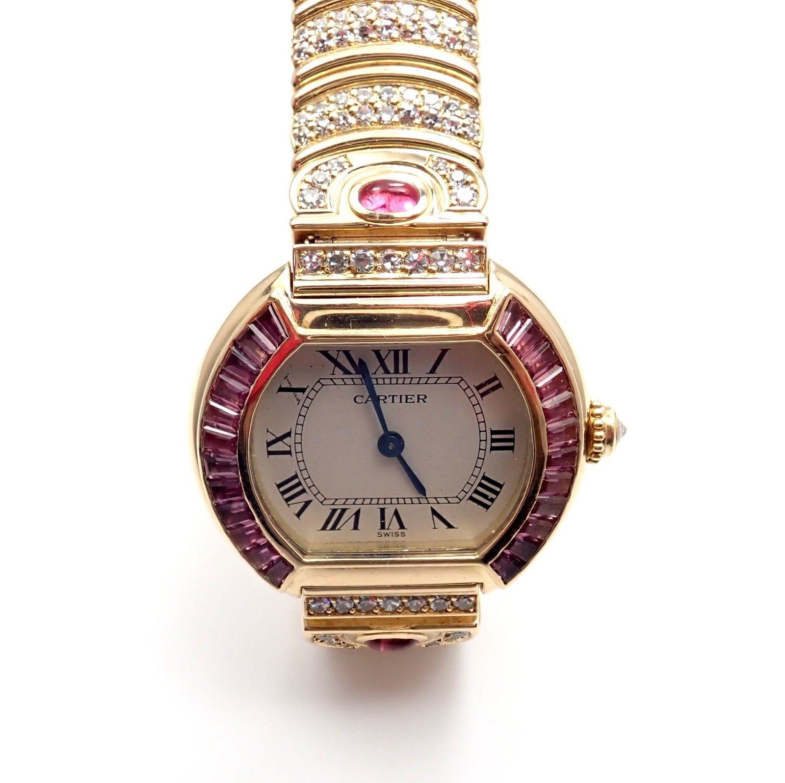 18k yellow gold and diamond and pink sapphire lady's Bagnoire wristwatch by Cartier. 
With original Cartier Diamonds: 1 on crown, 358x on band and case. Approx 4ctw. VVS2 Clarity, G Color.
Original Pink Sapphire: 2x Cabochon, 24