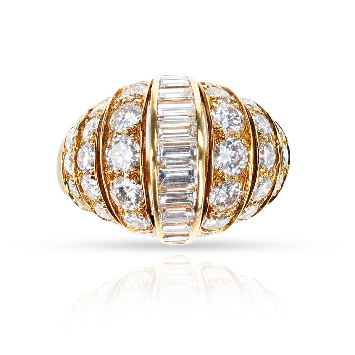 Une bague Cartier Paris Bombe Diamant en or jaune 18k. Les diamants pèsent environ 4 carats. La taille de la bague est de 6,50. Le poids total de la bague est de 10.05 grammes. 

SKU : 1094-RABTEJYA

