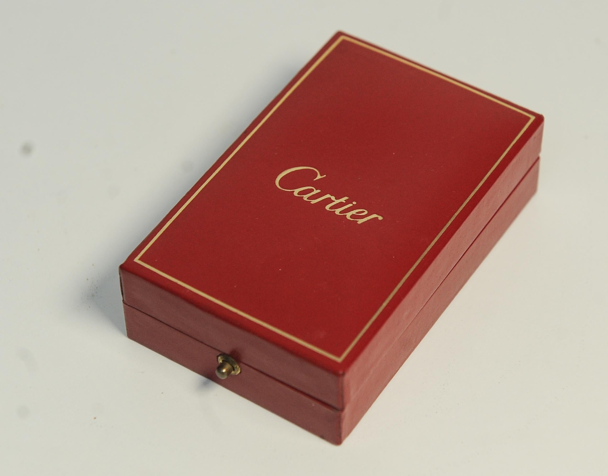 Elegant and Stylish Rare Cartier Briquet Bark Design Gas Gold Plated Cigarette Lighter Cased With Original Box  No.7406489

Fully Working makes an ideal gift for his or her.
