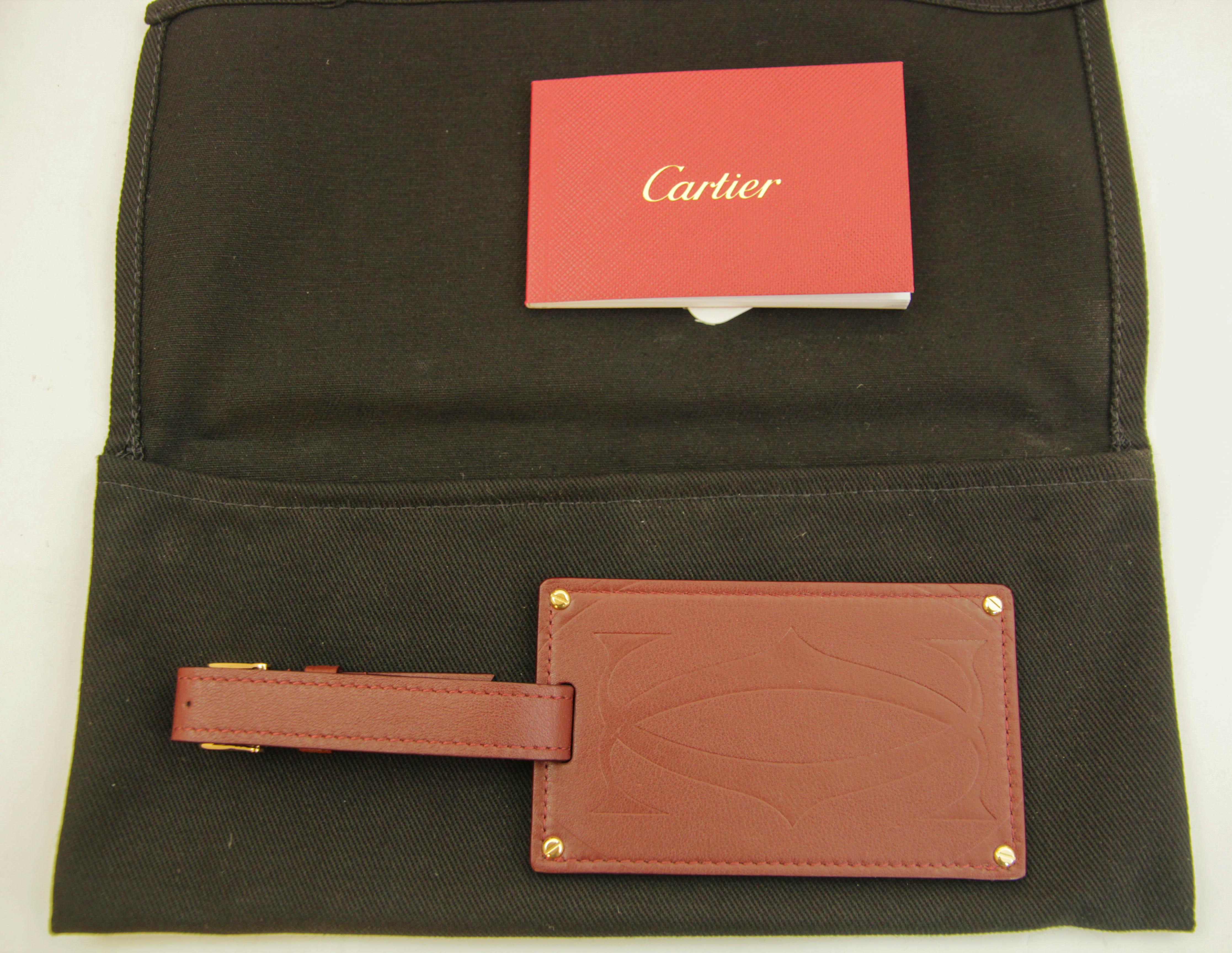 Women's or Men's Cartier Paris Burgundy Calfskin Leather Luggage Tag For Sale