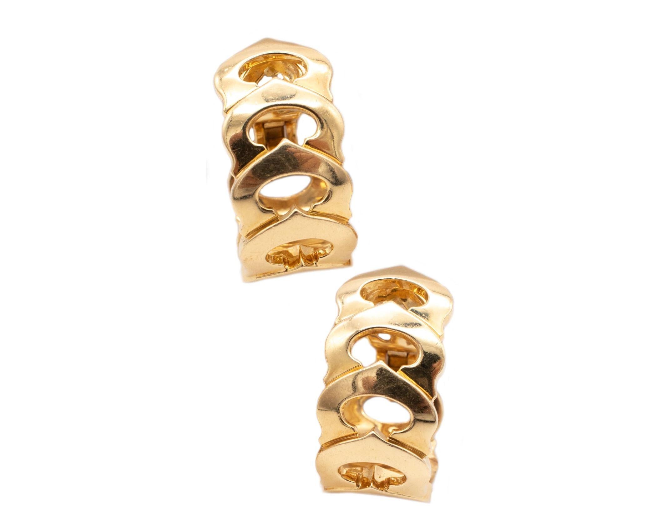 Great pair of hoop earrings designed by Cartier.

A beautiful iconic creation made in Paris France by the house of Cartier. These nice pair of hoop earrings has been crafted in solid yellow gold of 18 karats with high polished finish. They are part