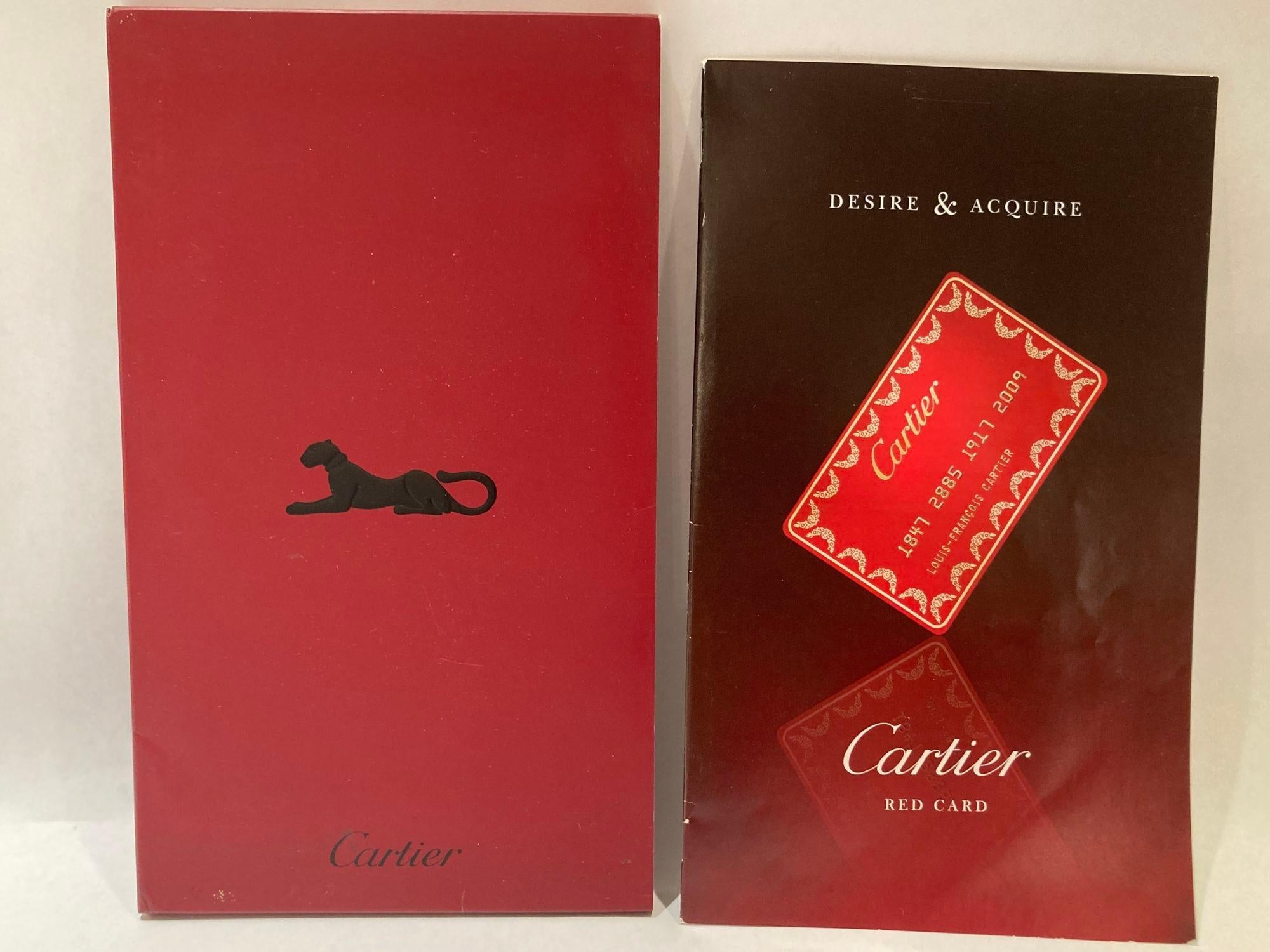 CARTIER Catalogue Collection Horlogerie-Gold Love Trinity Panthere Books
Collection of 3 Authentic CARTIER Books catalogue in red Cartier Panther sleeve including the following:
Cartier Catalogue & Pricing Guide.
Collection of Watches, Writing