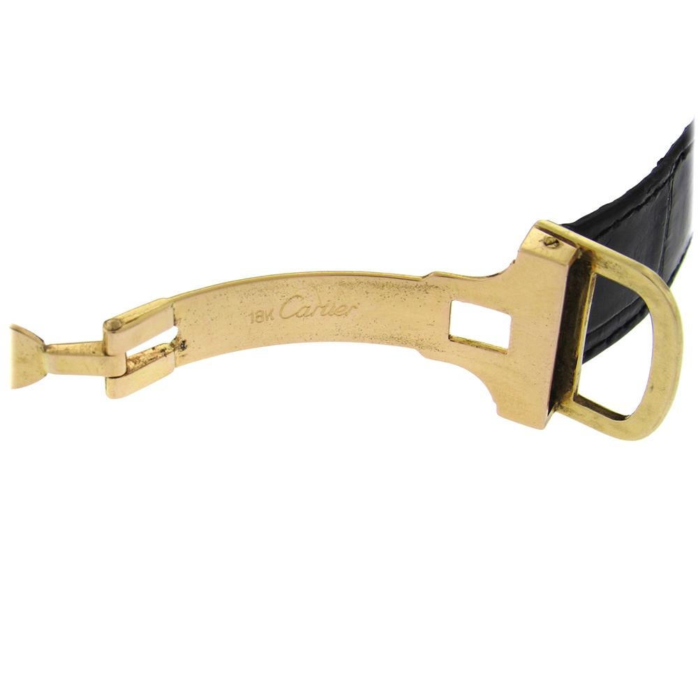 18K yellow gold Cartier Paris Ceinture model, made in the 1970’s is a fine, self-winding octagonal, 18K yellow gold wristwatch with Cartier 18K rose gold deployant buckle. The case measures 31mm x 31mm and has a stepped bezel, inset winding crown.