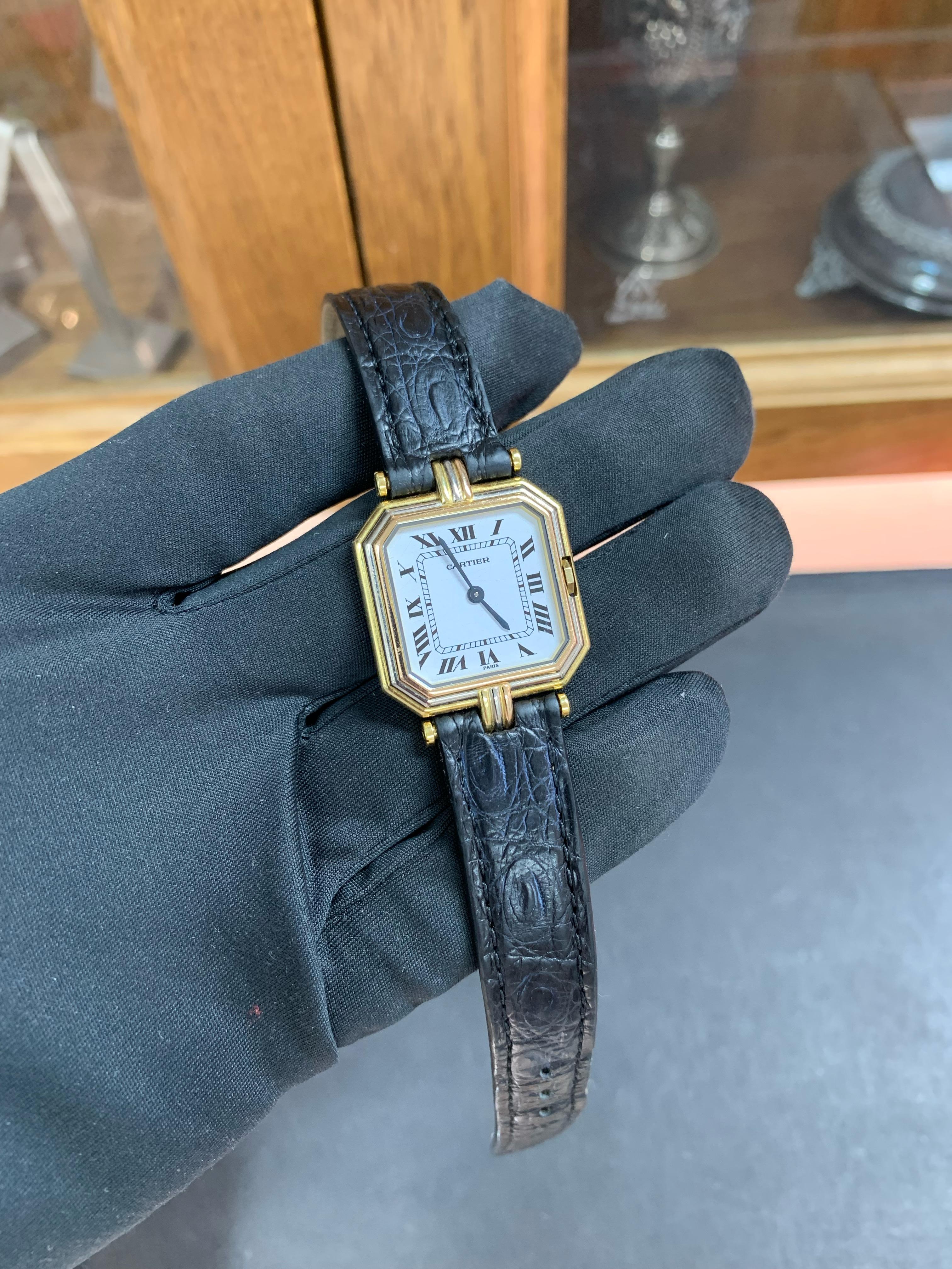 In Mint Condition.
Swiss Made, Cartier Ceinture in 18k Yellow, White & Rose Gold. Solid 18k Gold.
Very Rare Model.
Beautiful Step-Bezel Case.
L Case Size, 26.5mm.
Highly Collectible.
Perfect For Any Occasion: Elegant, Casual, Dress, Formal.
Great