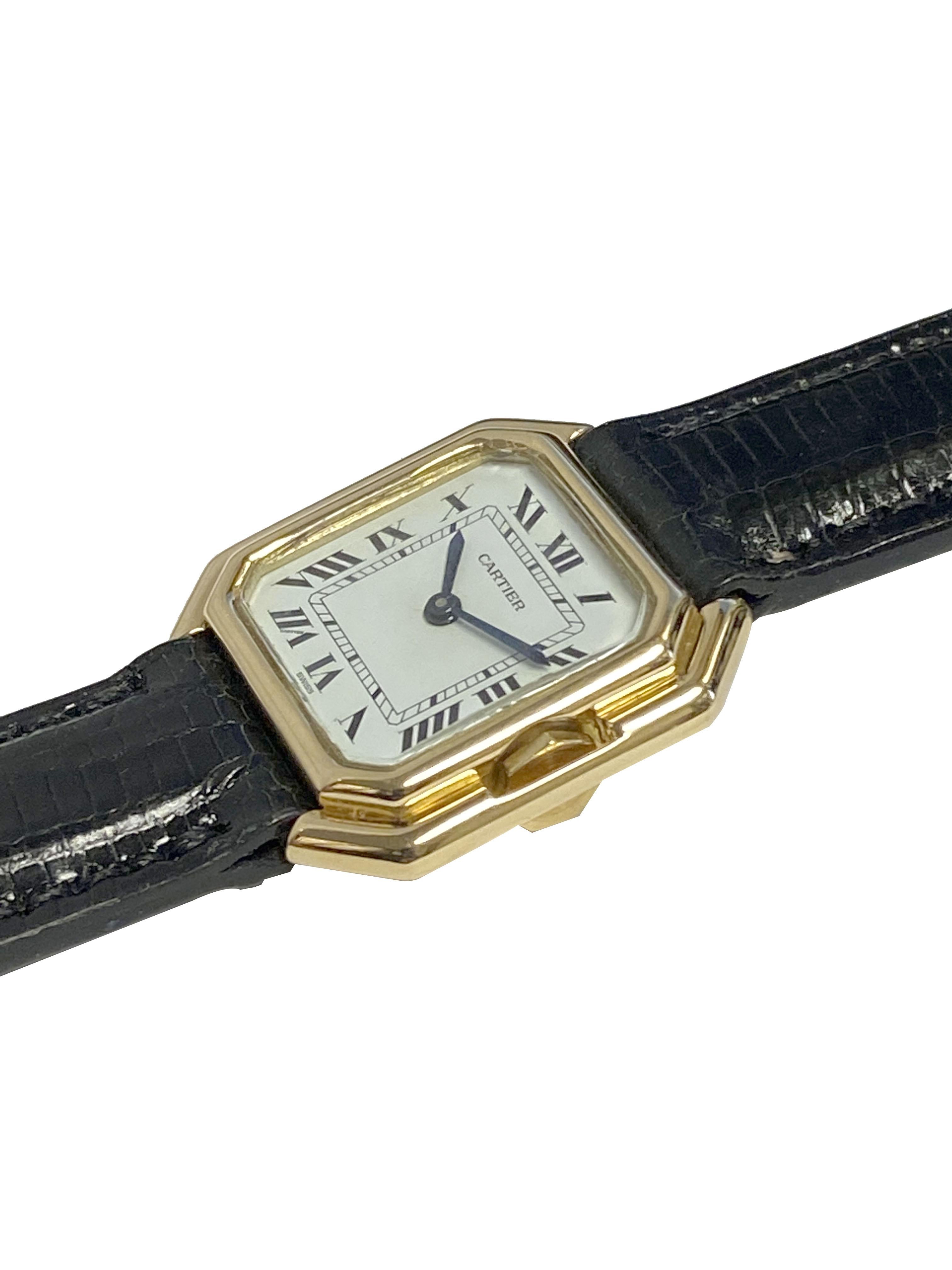 Circa 1970s Cartier Centure Wrist Watch,  24 X 24 M.M. 18k Yellow Gold 3 piece stepped case. Mechanical, manual wind movement, White dial with Black Roman numerals. New Hadley Roma Padded Black Lizard Strap with Cartier Gold Plate Tang buckle, watch