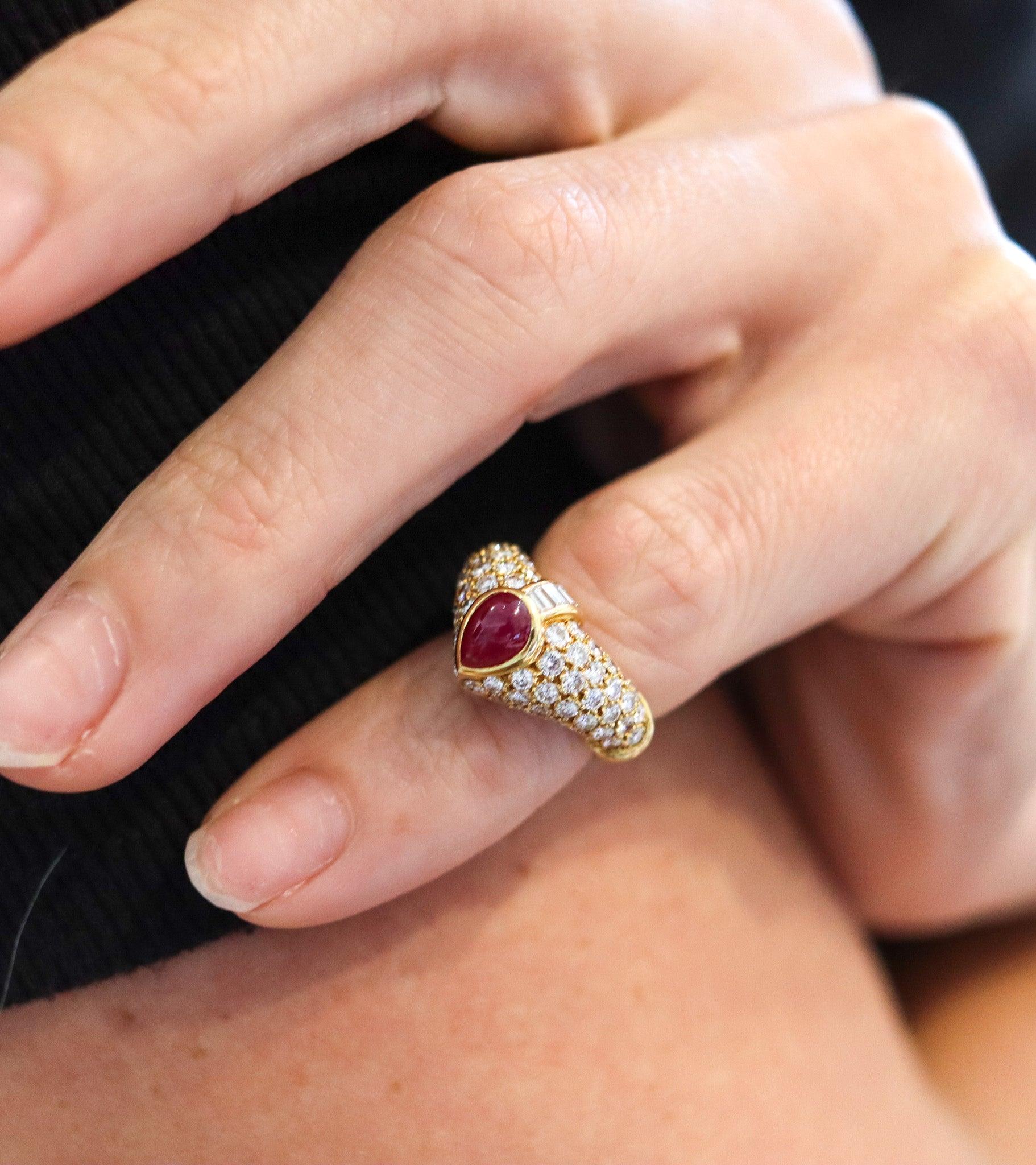 Classic cocktail earrings designed by Cartier Paris.

This is a beautiful and rare cocktail ring created in Paris France by the iconic jewelry house of Cartier. The modernist ring has been carefully crafted with classic semi-bombe patterns in solid