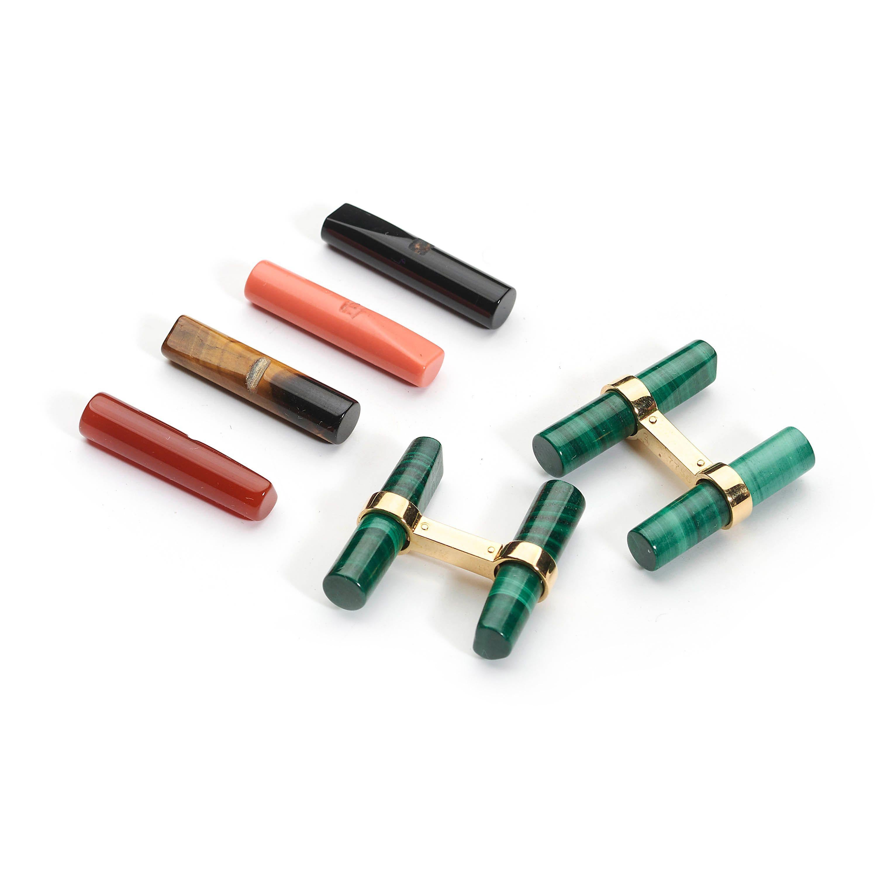 A Cartier Paris multi gemstone baton cufflink set, with interchangeable bars or batons, consisting of malachite, black onyx, coral, tiger eye and cornelian, with a pair of cufflink mounts, in 18ct yellow gold, signed Cartier, stamped 750, numbered G