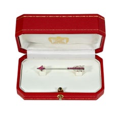 Cartier, Paris diamond and ruby arrow jabot brooch