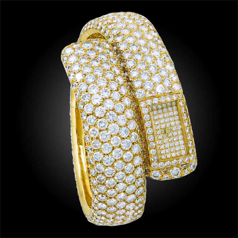 Cartier Paris Diamond Gold Bangle Watch In Excellent Condition For Sale In New York, NY