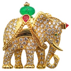 Cartier Paris Elefantenbrosche 18Kt Gold mit 5,24 Karat Diamanten, Smaragden und Rubinen
