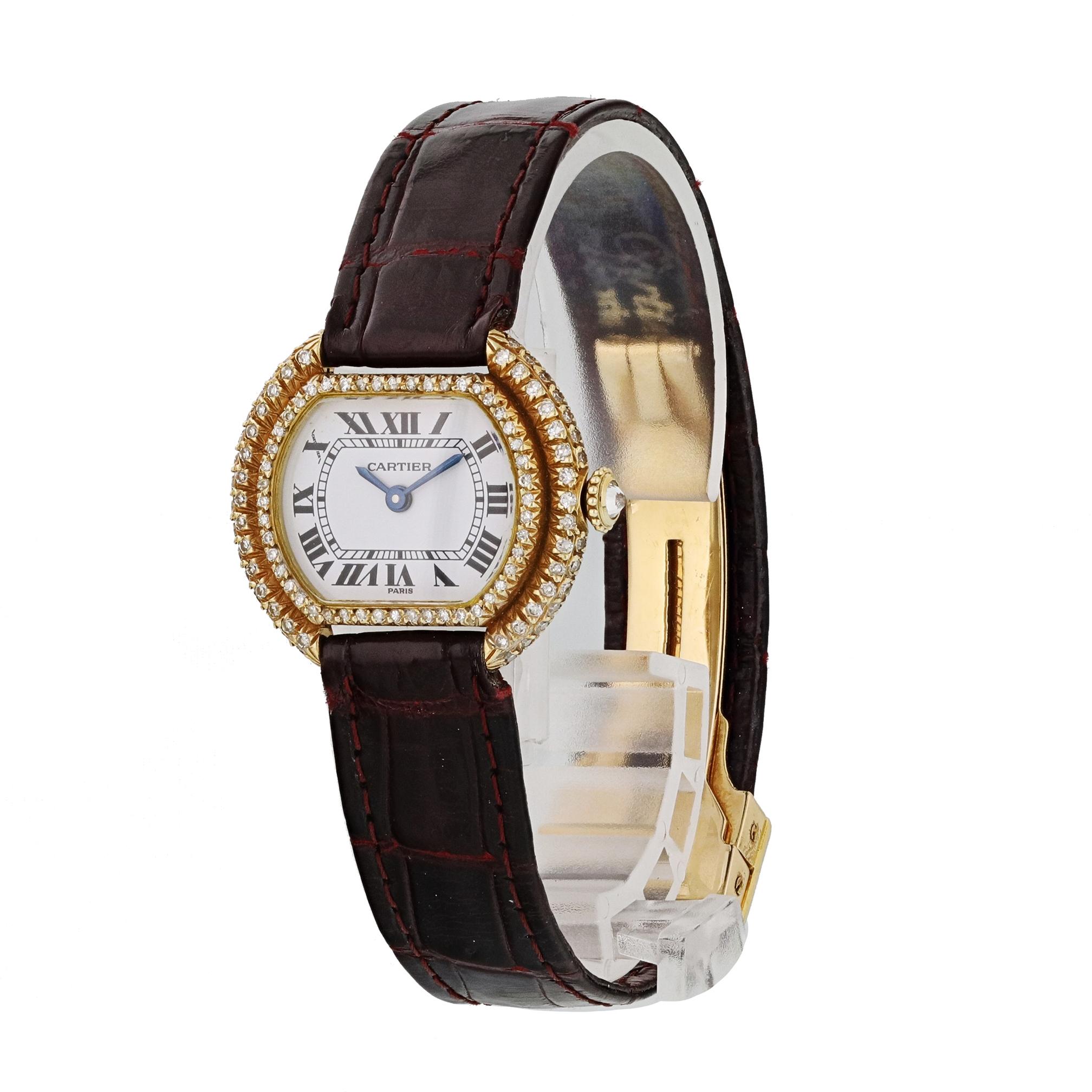 Cartier Paris Ellipse Gondole 18k Yellow Gold Ladies Watch.
28mm 18k Yellow Gold case hand set with diamonds. 
Yellow Gold Stationary bezel hand set with diamonds. 
White dial with Blue steel hands and roman numeral hour markers. 
Minute markers on