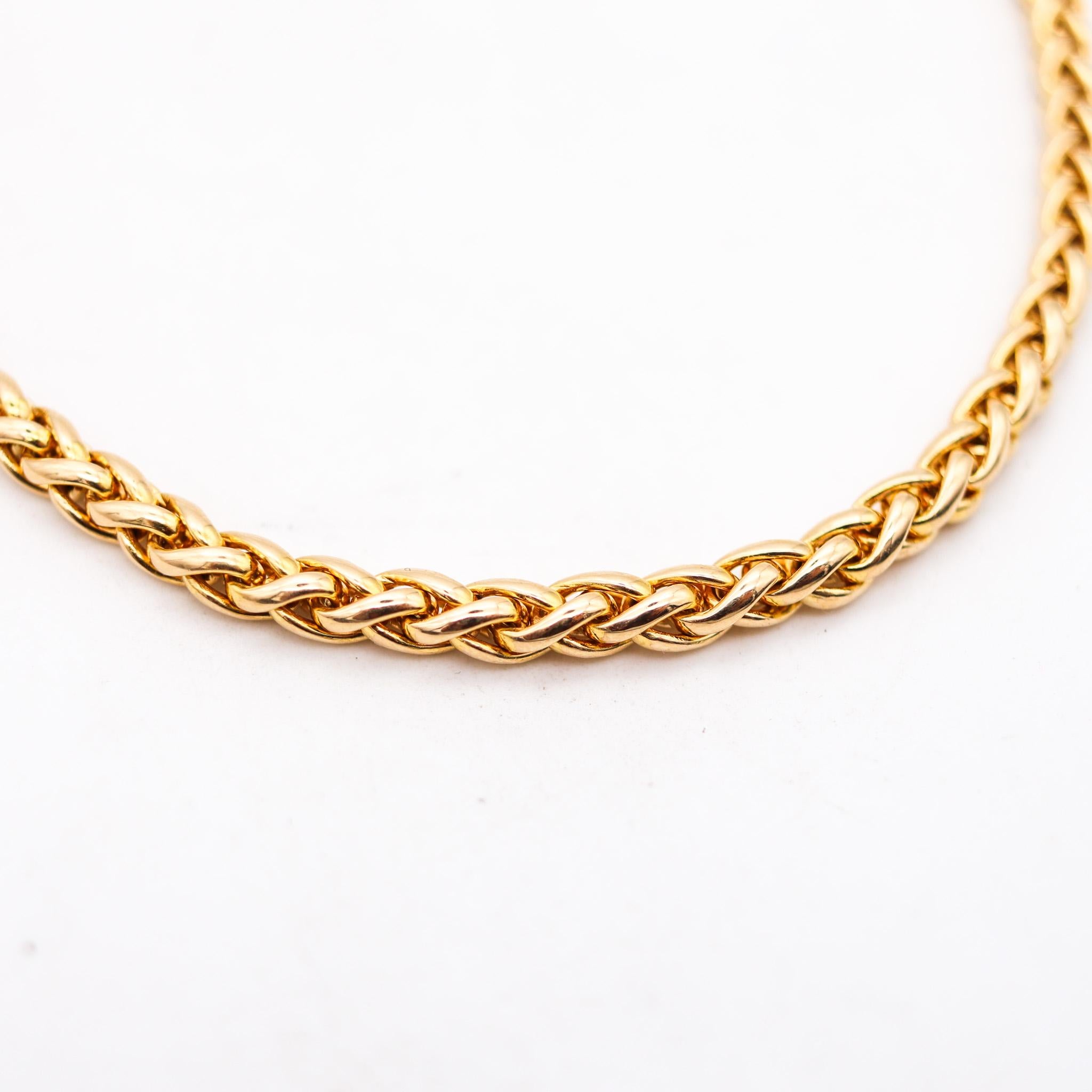 A necklace chain designed by Cartier.

Very wearable necklace chain, created in Paris France by the jewelry house of Cartier. It was crafted with intricate woven links made up of solid yellow gold of 18 karats with high polished finish. This piece