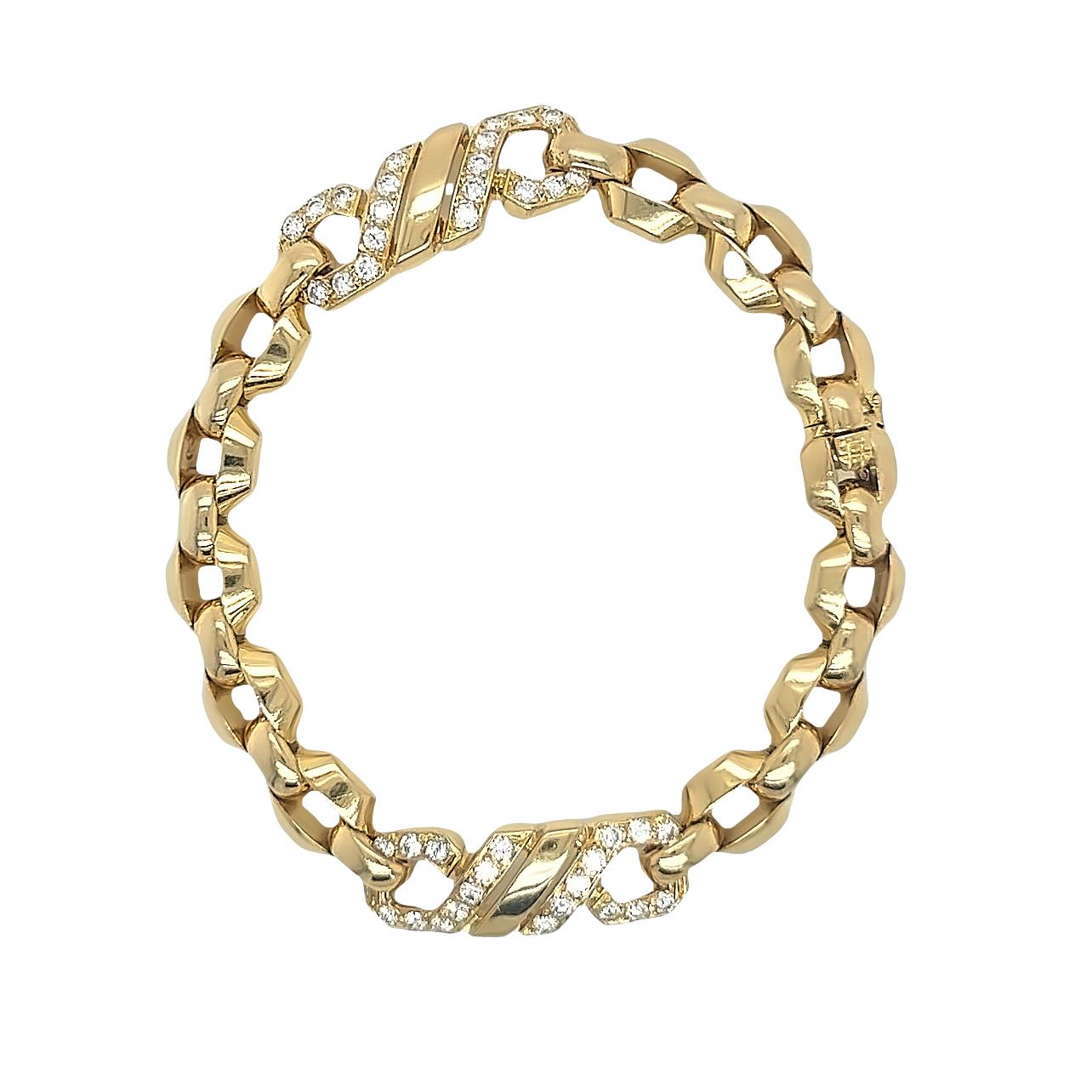 18k Yellow Gold Foxtrot Diamond Bracelet by Cartier Paris 1984 

This stylist piece never goes out of fashion, a real Cartier collectors piece for any deserving buyers.

Set with 40 round brilliant cut diamonds VVS1 clarity, E,F Colour total diamond