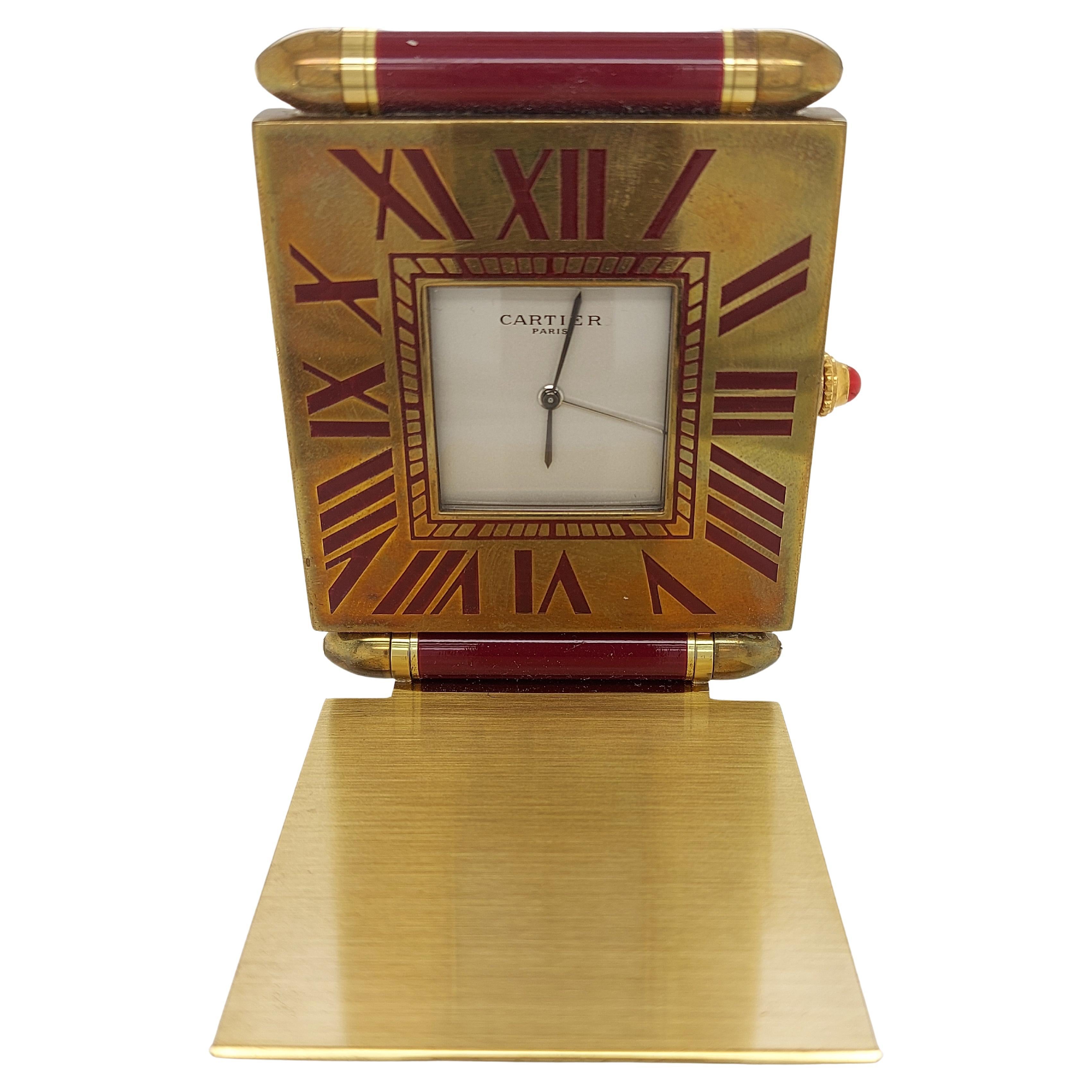 Cartier Paris, French Quartz Quadrant Traveling Alarm Clock



Movement: Quartz, Hand winding

Dial: Large white dial with Roman numerals

Case: Gilt metal case, height 65 mm x width: 50 mm x 10.4 mm

Total weight: 176.3 gram / 6.220 oz / 113.4 dwt