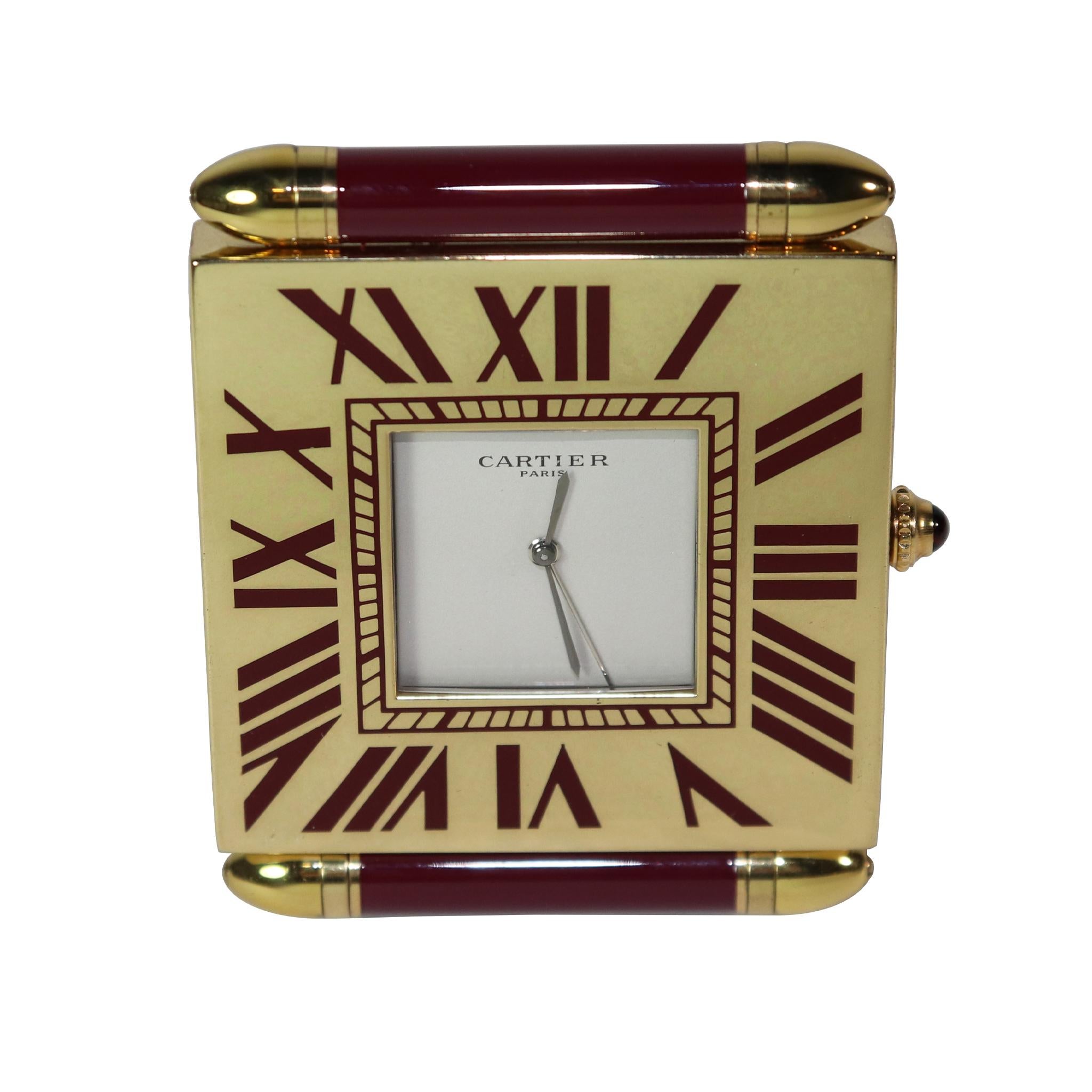  Vintage Cartier ladies, or gentlemen's folding gold-plated quadrant traveling alarm clock.
Circa  second quarter of the 20th century. Displays on its flip-over hinged base stand. 

Personally inscribed from ABBY to ( MARY) Clancy Collins daughter