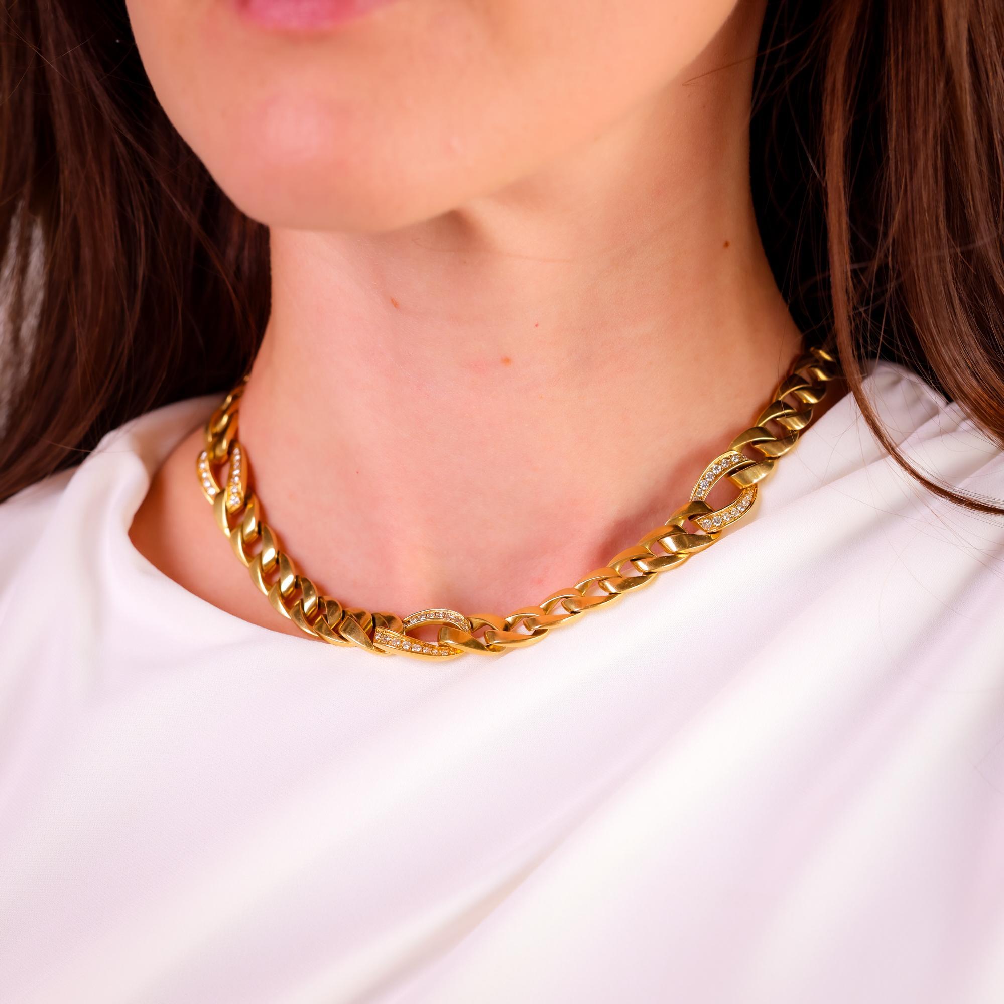 This vintage Cartier Paris link chain necklace exudes luxury with 1.50 carats of dazzling diamonds, set in bold 18k yellow gold for timeless elegance.

Brand: Cartier Paris
Center stone: 48 round brilliant cut diamonds 
Weight: Approximately 1.50
