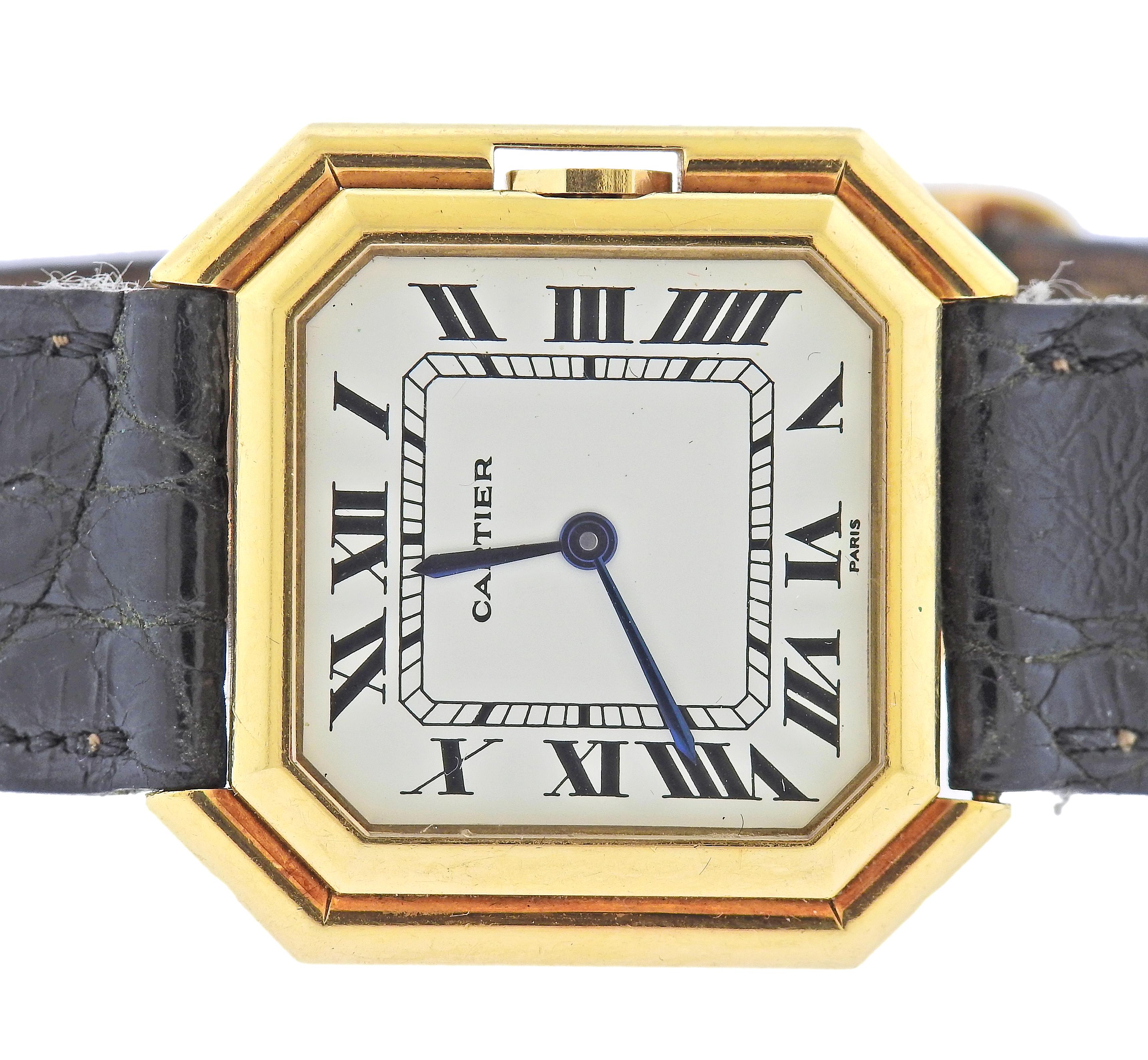 18k yellow gold Cartier Paris watch, with automatic movement.  Case measures 30mm x 30mm, with leather band and 18k gold Cartier deployant buckle. Marked on the case back - Cartier, Automatique, Paris, 170011466. Weight - 48.7 grams.
