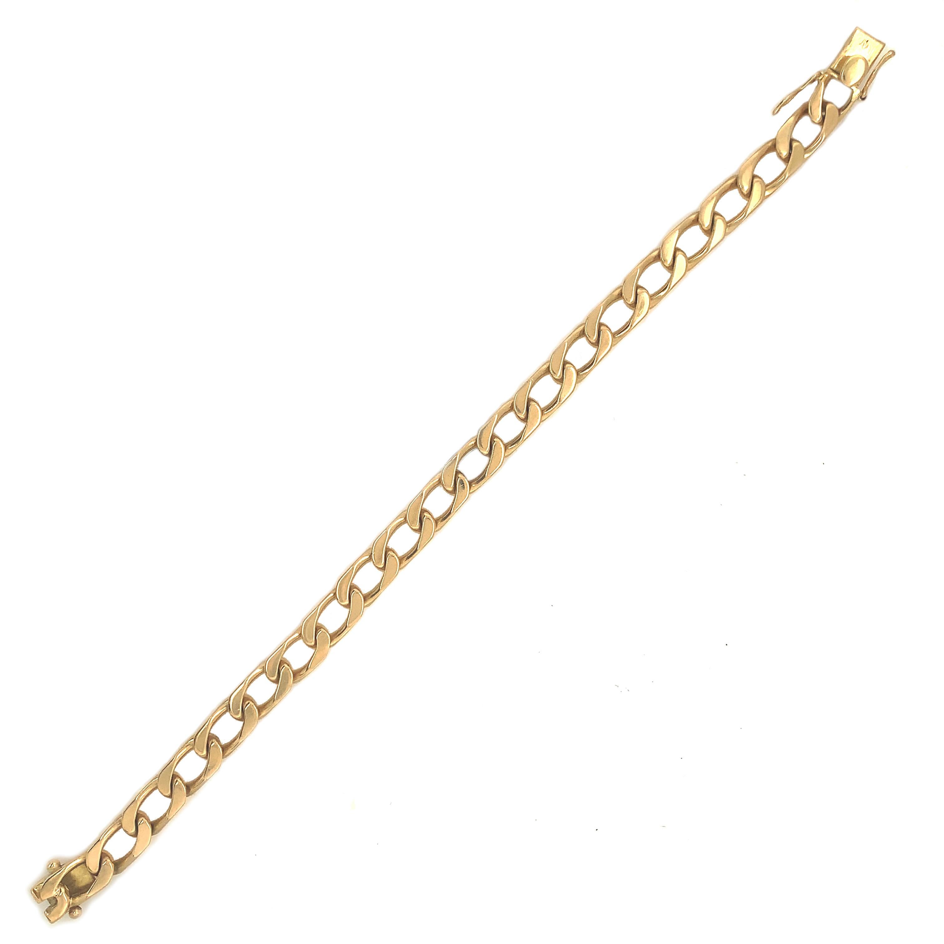 Classic curb link bracelet.  Made, signed and numbered by CARTIER Paris.  Solid gauge 18K yellow gold.  7 1/2