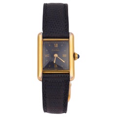 Cartier Paris gold plated with black leather strap buckle Tank watch